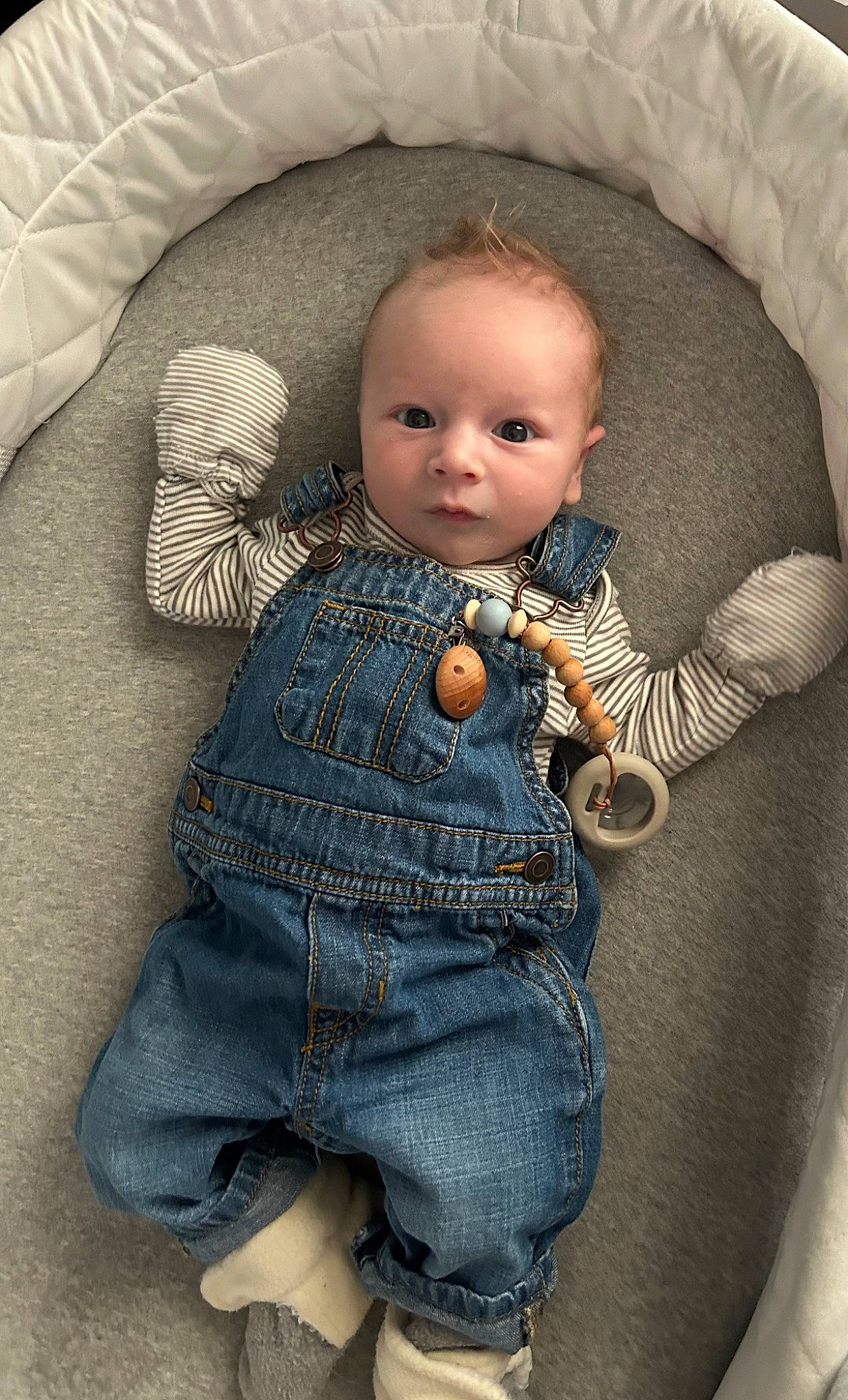 Lucien joined the competition — help win amazing prizes! baby, baby_toddler_clothing, cheek, comfort, doll, dress, eye, face, grey, head, iris, linens, lip, nose, outerwear, person, skin, sleeve, textile, toddler