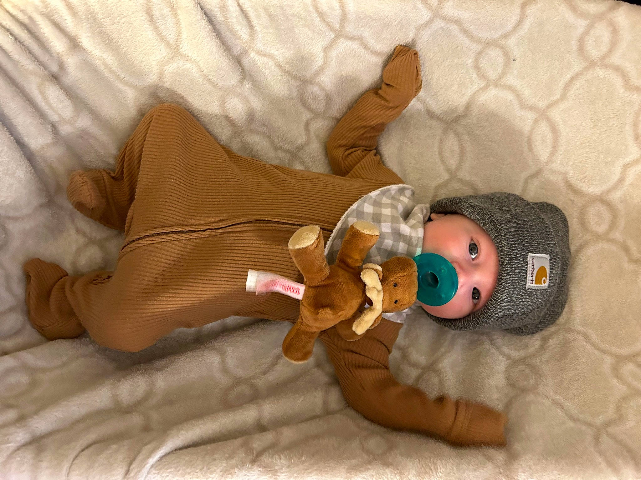 Lucien is registered to the contest to win money with this photo: baby, baby_products, baby_safety, baby_sleeping, baby_toddler_clothing, baby_toys, bed, comfort, doll, fawn, head, headwear, infant_bed, linens, person, plush, room, stuffed_toy, textile, toy