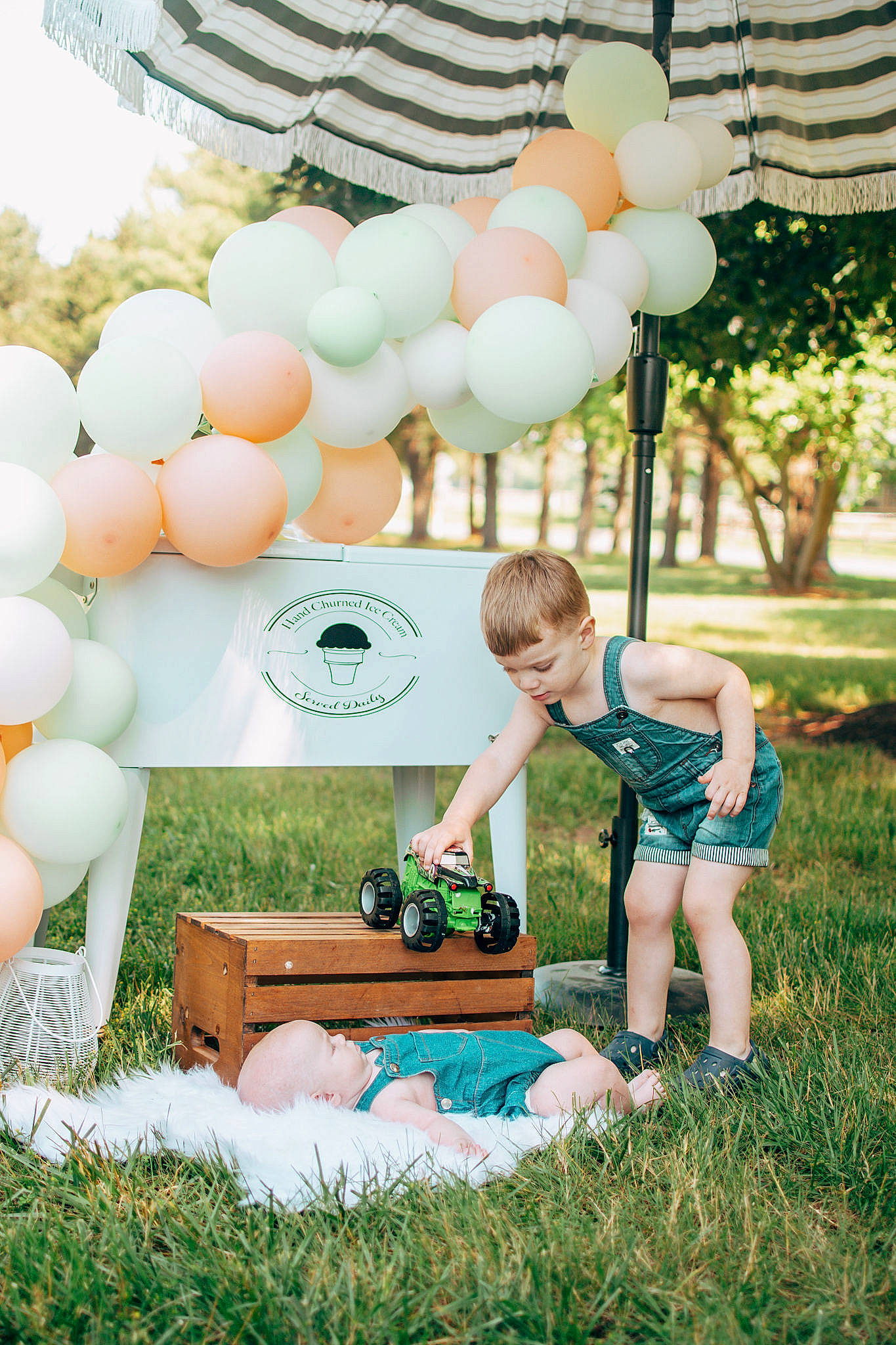 Walter joined the competition — help win amazing prizes! balloon, child, clothing, event, fun, grass, green, happy, leg, leisure, nature, party_supply, person, photograph, pink, plant, recreation, shorts, summer, toddler