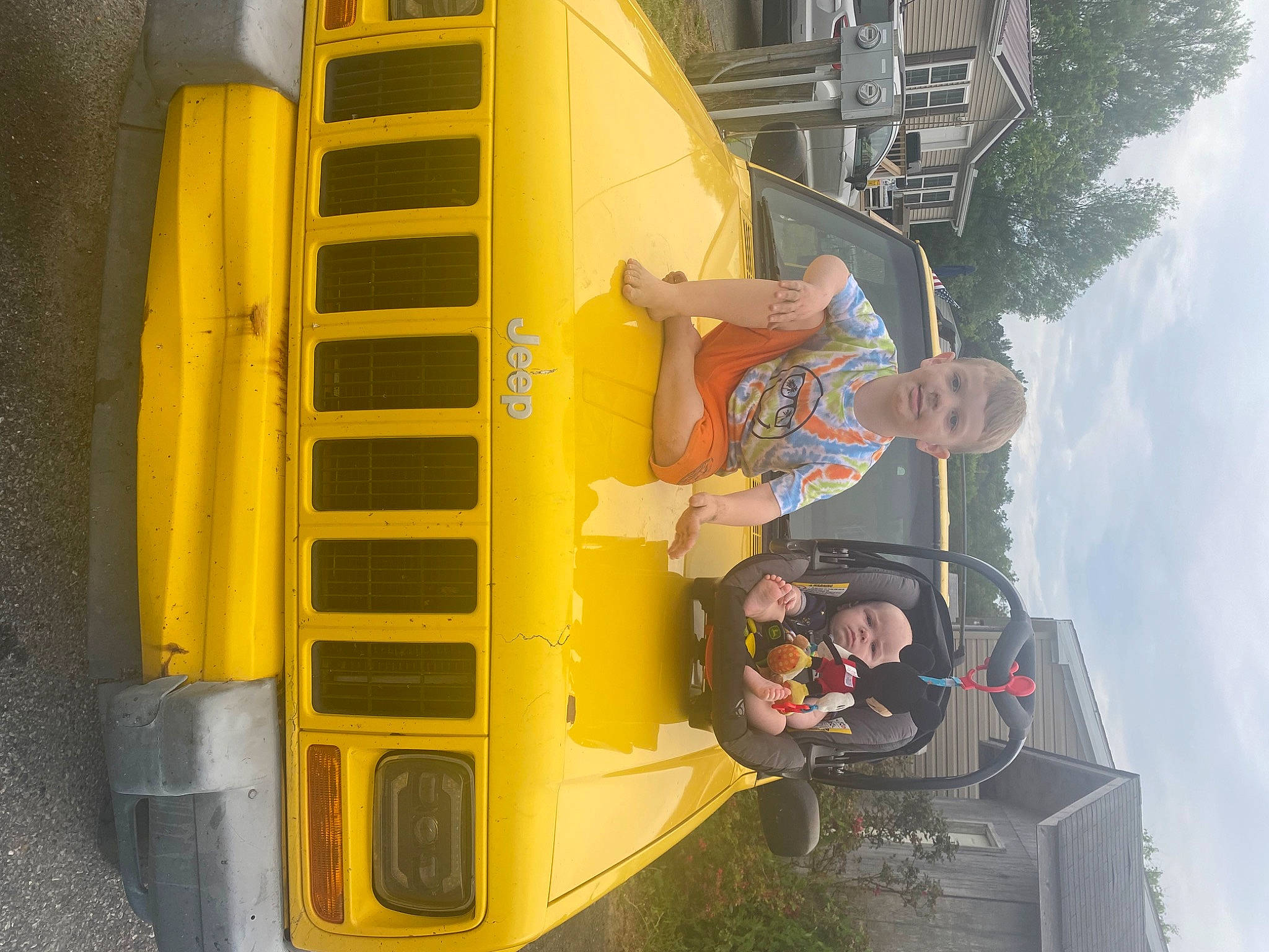 Walter joined the competition — help win amazing prizes! auto_part, automotive_exterior, bumper, cloud, engineering, fun, hat, hood, line, machine, motor_vehicle, person, sky, smile, tire, toddler, travel, vehicle, vehicle_door, wheel