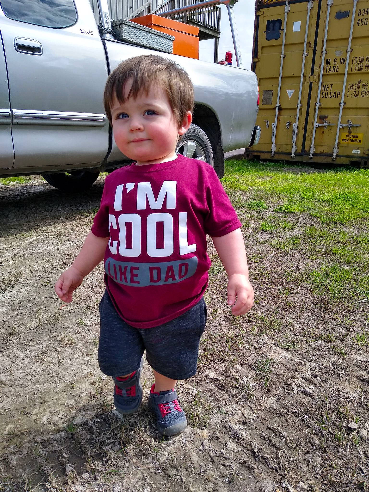 Cj is registered to the contest to win money with this photo: car, child, city_car, family_car, fun, grass, joy, person, plant, subcompact_car, summer, t_shirt, toddler, vacation, vehicle, vehicle_door