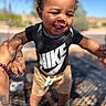 toddler, child, smiling, happy, outdoor, nike, black_shirt, shorts, holding_hands, person, footwear, sunlight, portrait, cute, curly_hair, expression, playful, daylight, skin, young