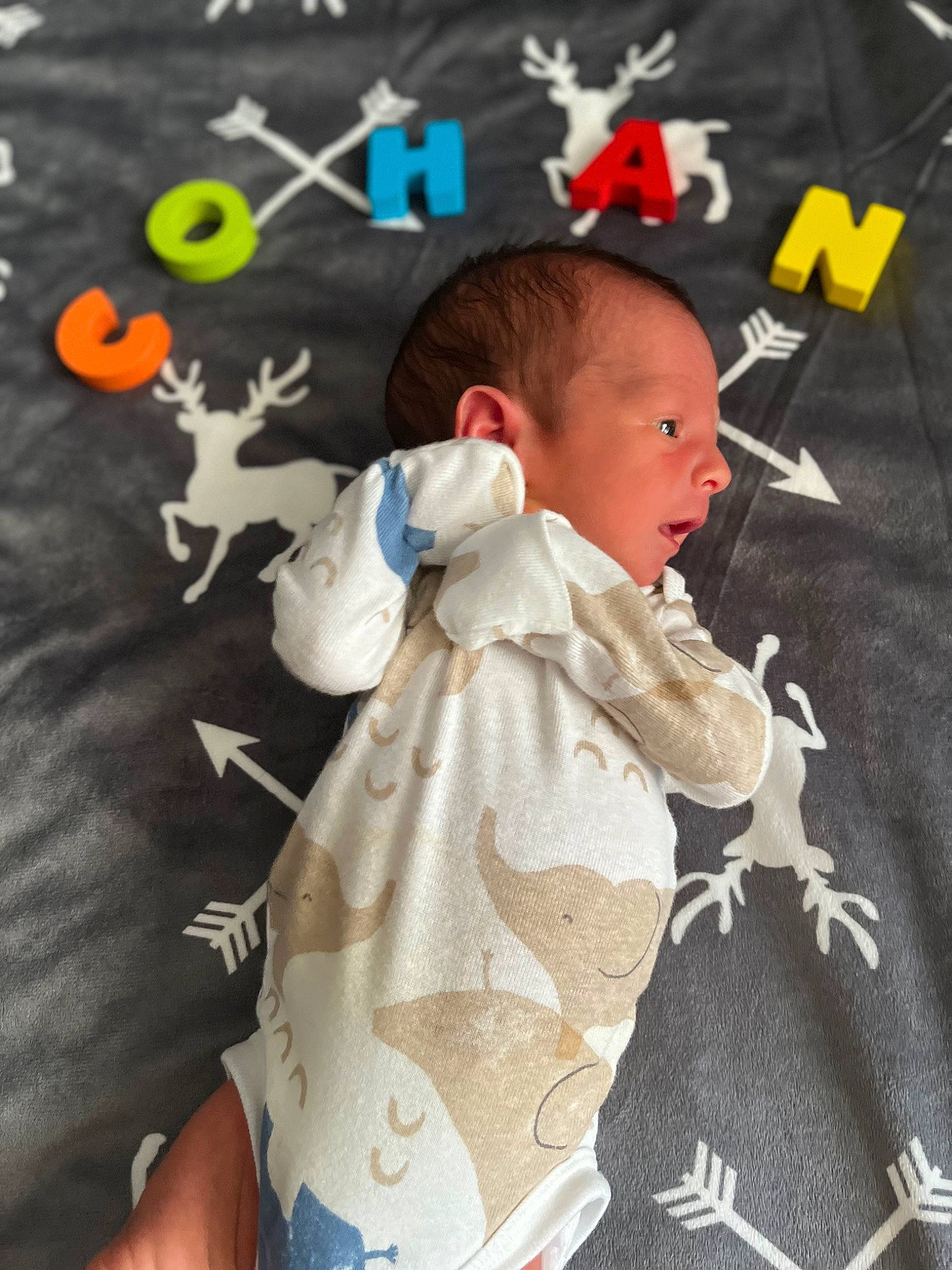 Cohan joined the competition — help win amazing prizes! art, baby, baby_products, baby_toddler_clothing, carmine, child, fictional_character, flooring, happy, linens, outerwear, pattern, person, photo_caption, play, room, sitting, sleeve, t_shirt, textile
