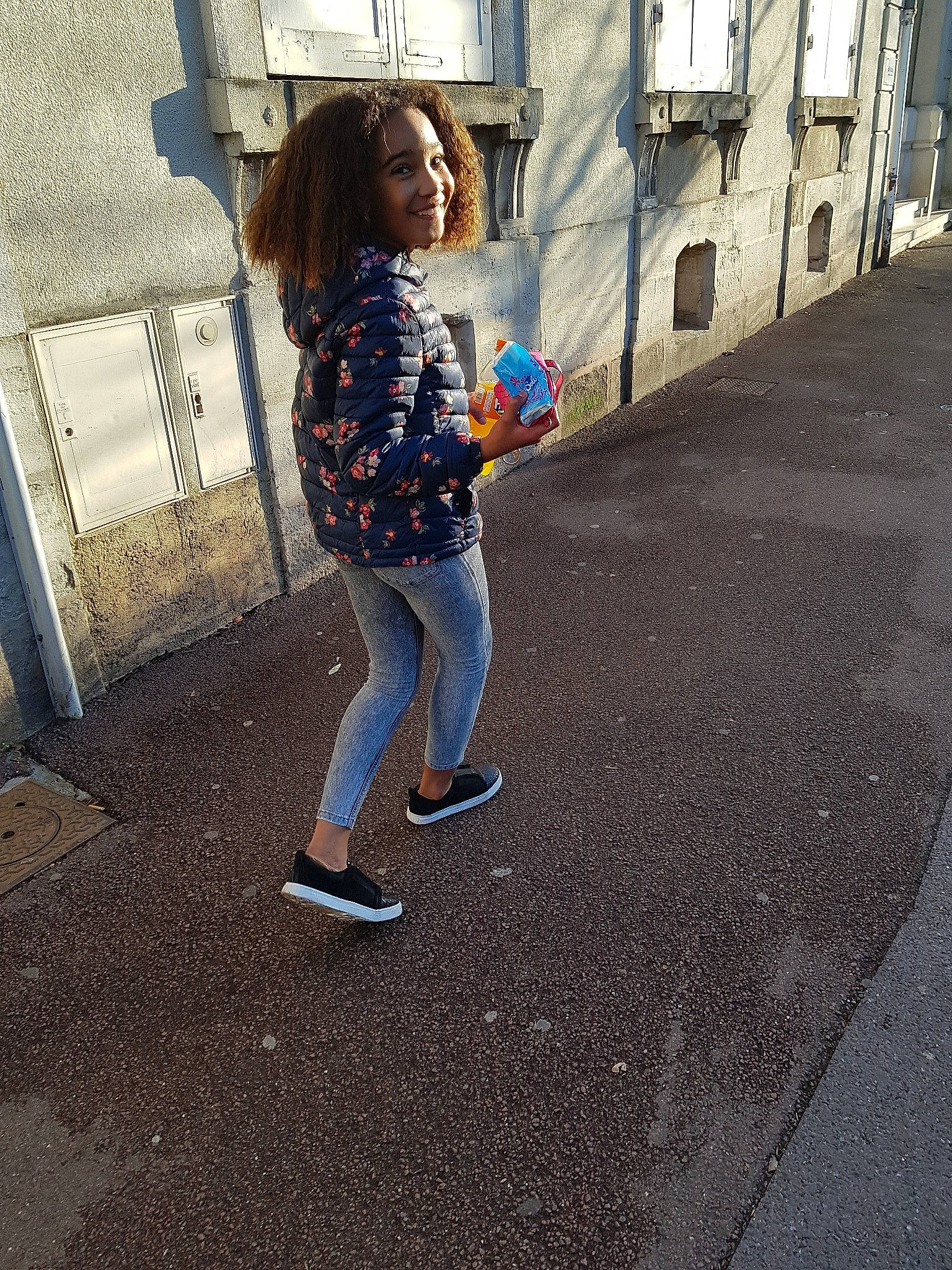 Karlly participe au concours pour gagner de l'argent avec cette photo : blue, child, clothing, cool, denim, design, footwear, fun, girl, infrastructure, jeans, joy, leg, outerwear, person, road, shoe, sitting, snapshot, standing