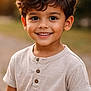 child, boy, smiling, portrait, outdoor, golden_hour, hair, face, eyes, skin, shirt, buttoned_shirt, short_sleeves, happy, cute, young, nature, bokeh, warm_light, casual
