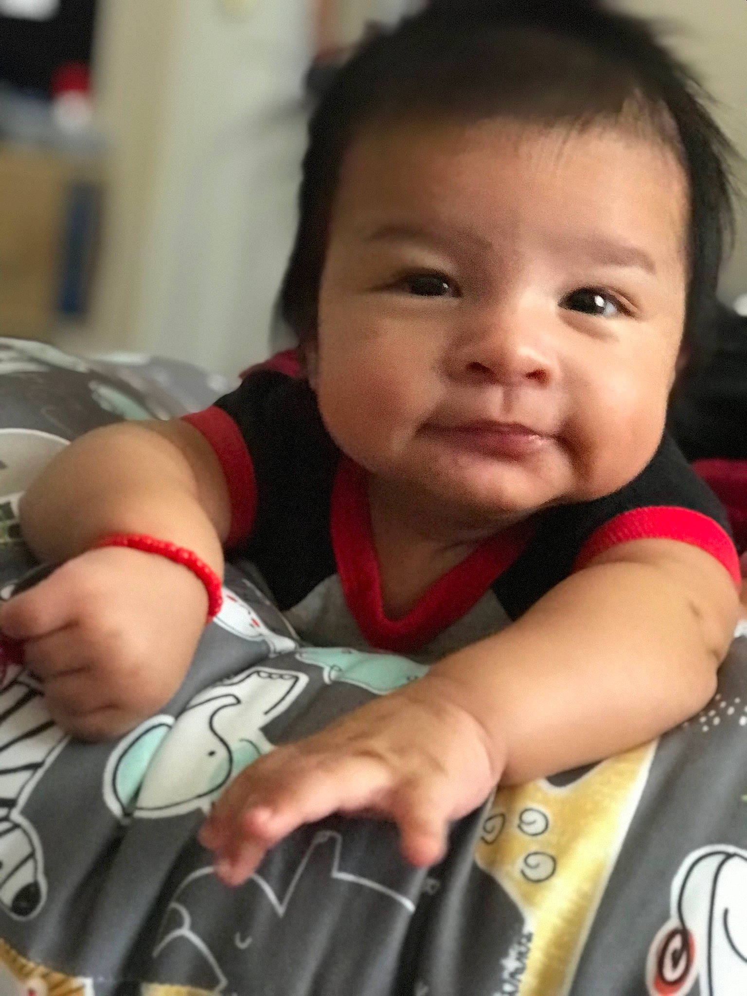 Nicolas joined the competition — help win amazing prizes! baby, baby_products, baby_toddler_clothing, carmine, cheek, child, eyelash, finger, hairstyle, happy, iris, mouth, nail, nose, person, personal_protective_equipment, sitting, skin, sleeve, thumb