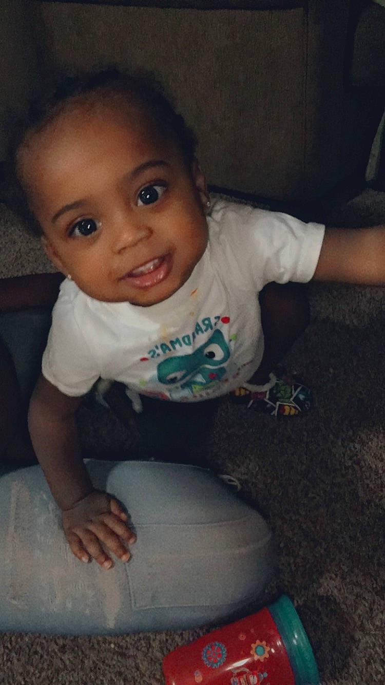 Quadir is registered to the contest to win money with this photo: adaptation, arm, baby, black_hair, cheek, child, eye, face, forehead, fun, head, leg, lip, mouth, nose, person, play, sitting, skin, smile