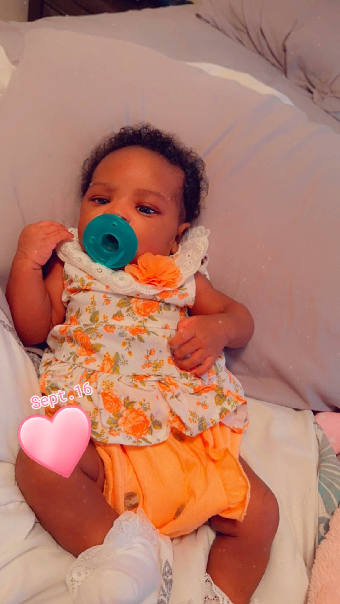 Taylor joined the competition — help win amazing prizes! baby, baby_toddler_clothing, cheek, comfort, dress, eyelash, face, finger, happy, head, mouth, nail, nose, orange, person, pink, shoulder, skin, sleeve, textile