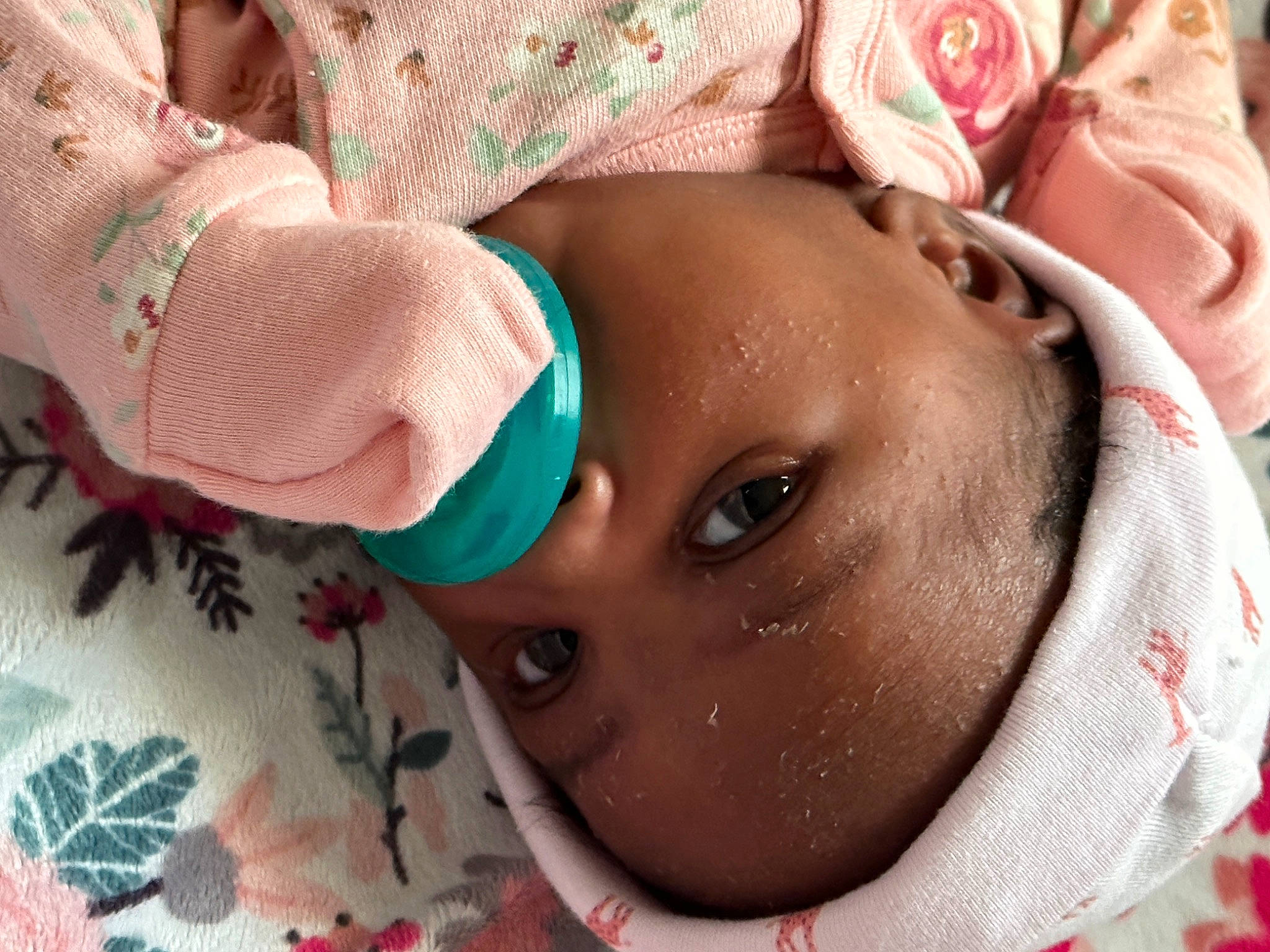 Taylor is registered to the contest to win money with this photo: baby, cheek, child, close_up, eye, eyebrow, eyelash, fashion_accessory, happy, headgear, iris, jewellery, lip, mouth, neck, nose, pattern, person, skin, textile