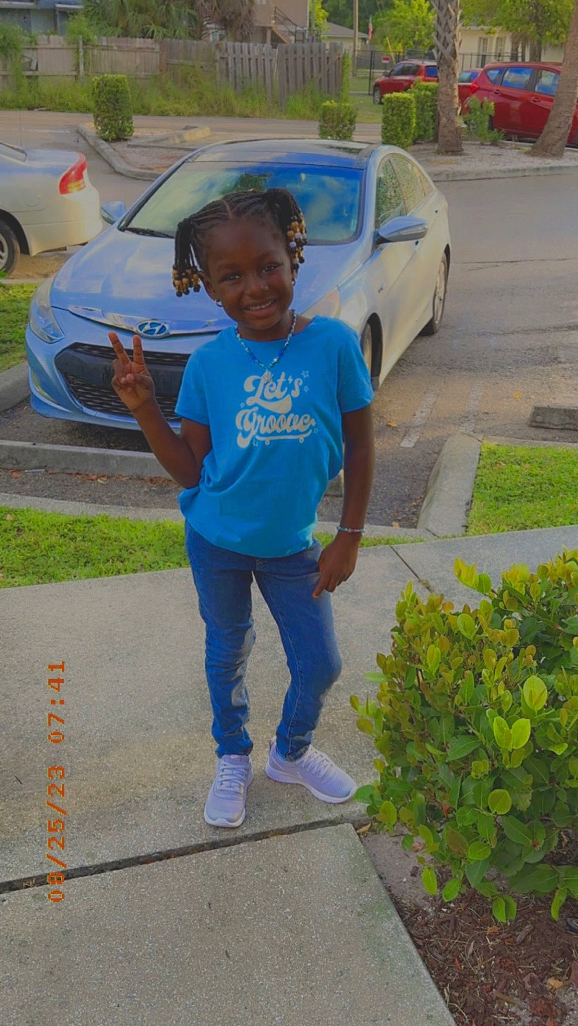 Amor joined the competition — help win amazing prizes! asphalt, automotive_exterior, car, electric_blue, family_car, grass, jeans, joy, land_vehicle, leisure, motor_vehicle, parking, person, plant, road, road_surface, sidewalk, t_shirt, tire, vehicle