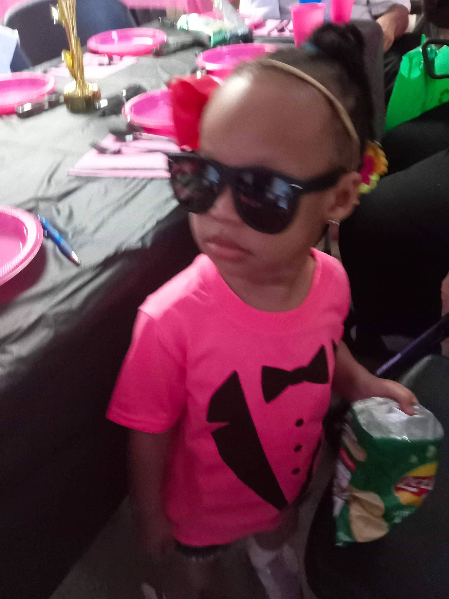 Brooke-angel is registered to the contest to win money with this photo: child, cool, event, eyewear, fun, glasses, goggles, happy, leisure, magenta, mouth, person, personal_protective_equipment, pink, red, sleeve, snapshot, sunglasses, t_shirt, toddler