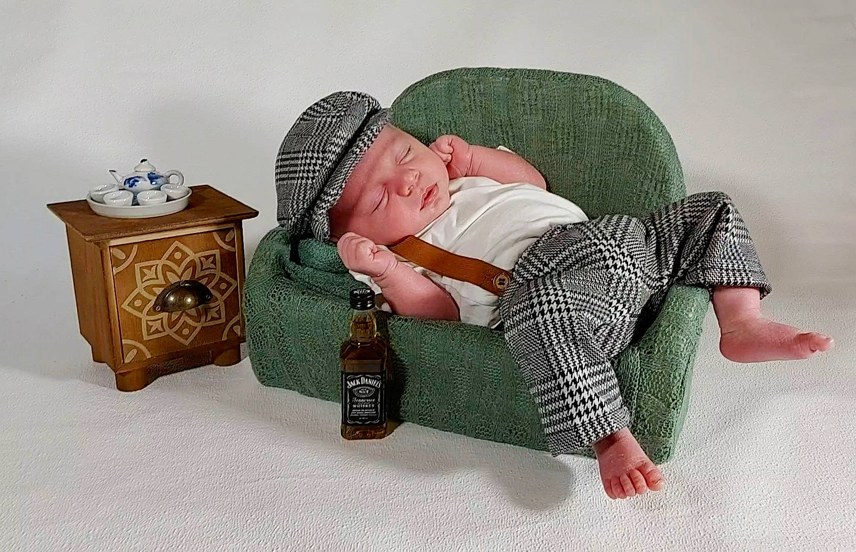 Bowden joined the competition — help win amazing prizes! baby, baby_sleeping, bag, bedding, box, child, comfort, fashion_accessory, flooring, headgear, headwear, linens, pattern, person, pillow, room, sitting, sun_hat, textile, throw_pillow