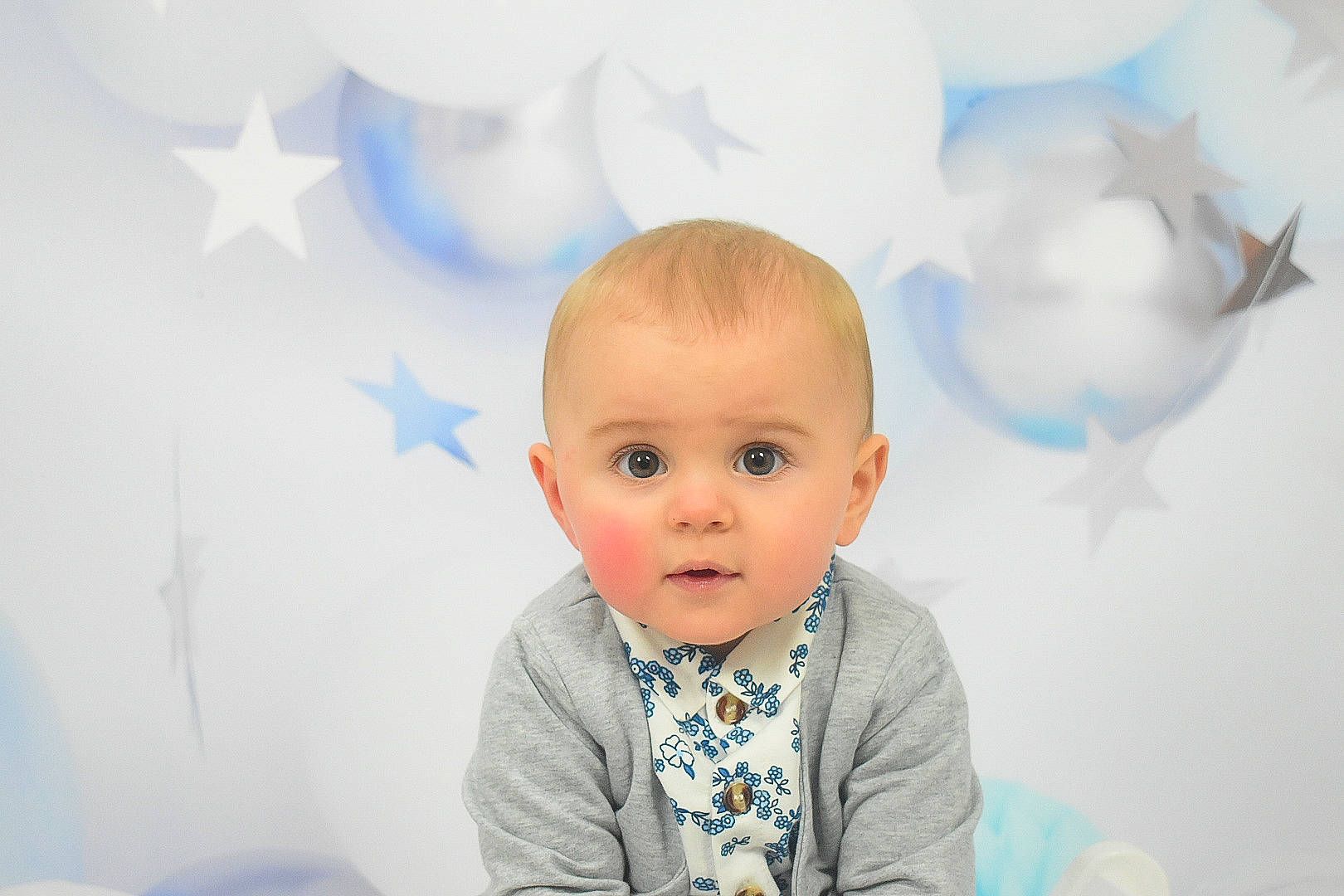 Bowden is registered to the contest to win money with this photo: art, baby, baby_toddler_clothing, blue, cheek, child, cloud, electric_blue, event, fun, happy, leisure, person, portrait_photography, room, sitting, sky, sleeve, surprise, t_shirt