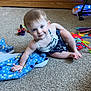 toddler, child, baby, carpet, blanket, toy, dresser, furniture, smile, indoor, floor, person, clothing, blue, cute, play, young, happy, face, skin