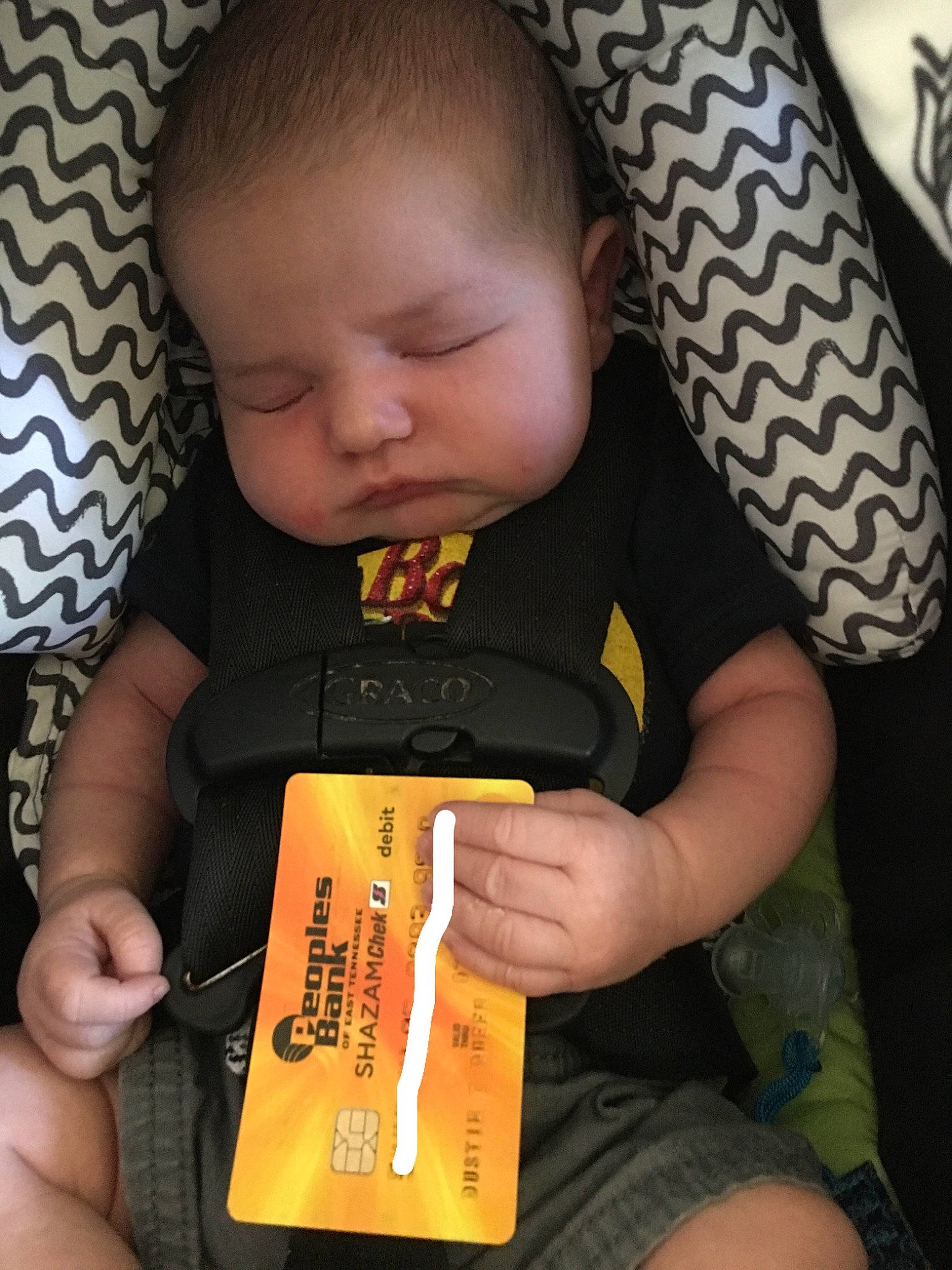 Raylee is registered to the contest to win money with this photo: baby, child, hand, neck, person, t_shirt, toddler