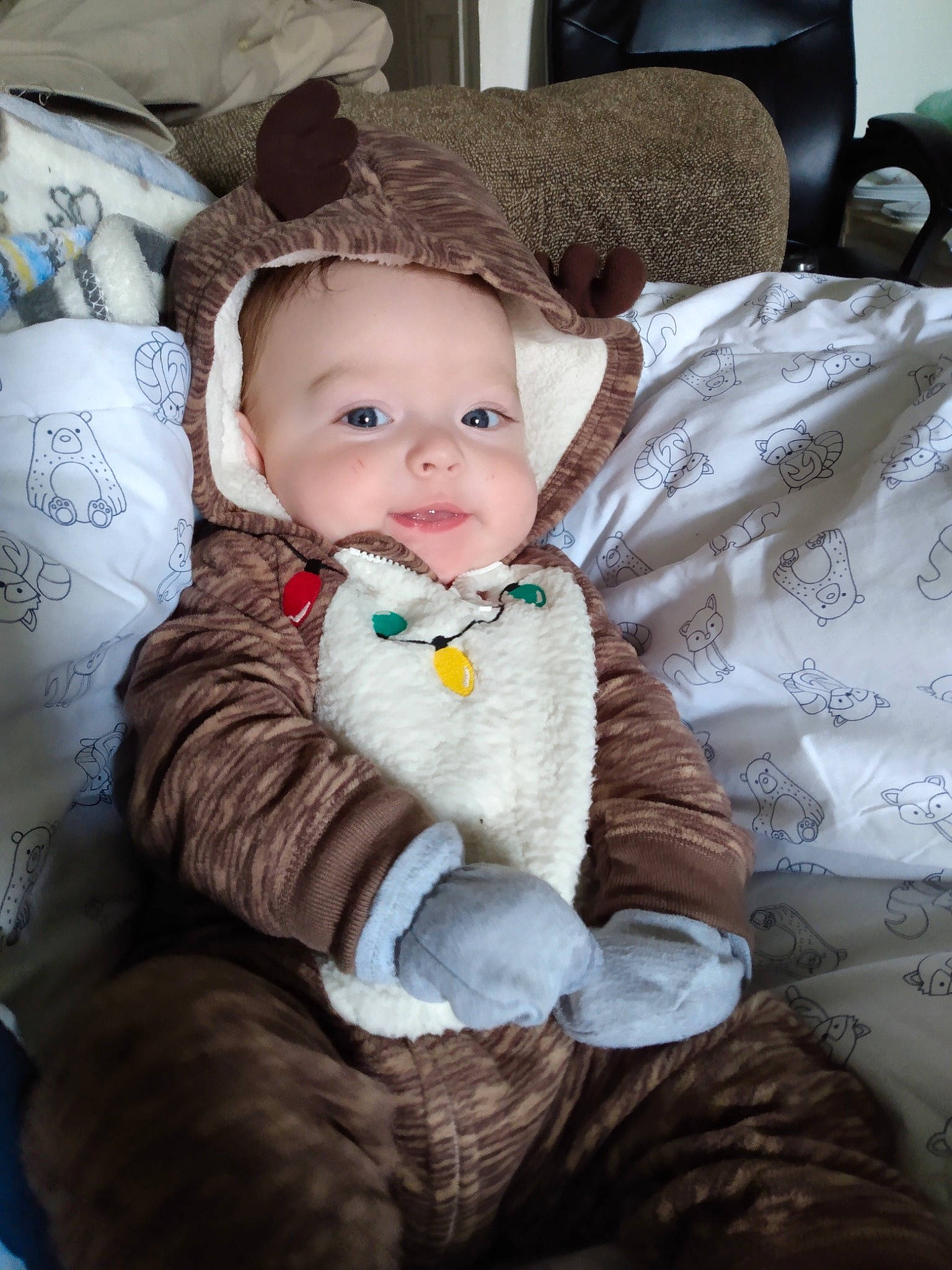 Amias joined the competition — help win amazing prizes! baby, baby_toddler_clothing, cheek, comfort, eye, face, fur, head, headgear, headwear, iris, lap, outerwear, person, sitting, skin, sleeve, smile, textile, toddler