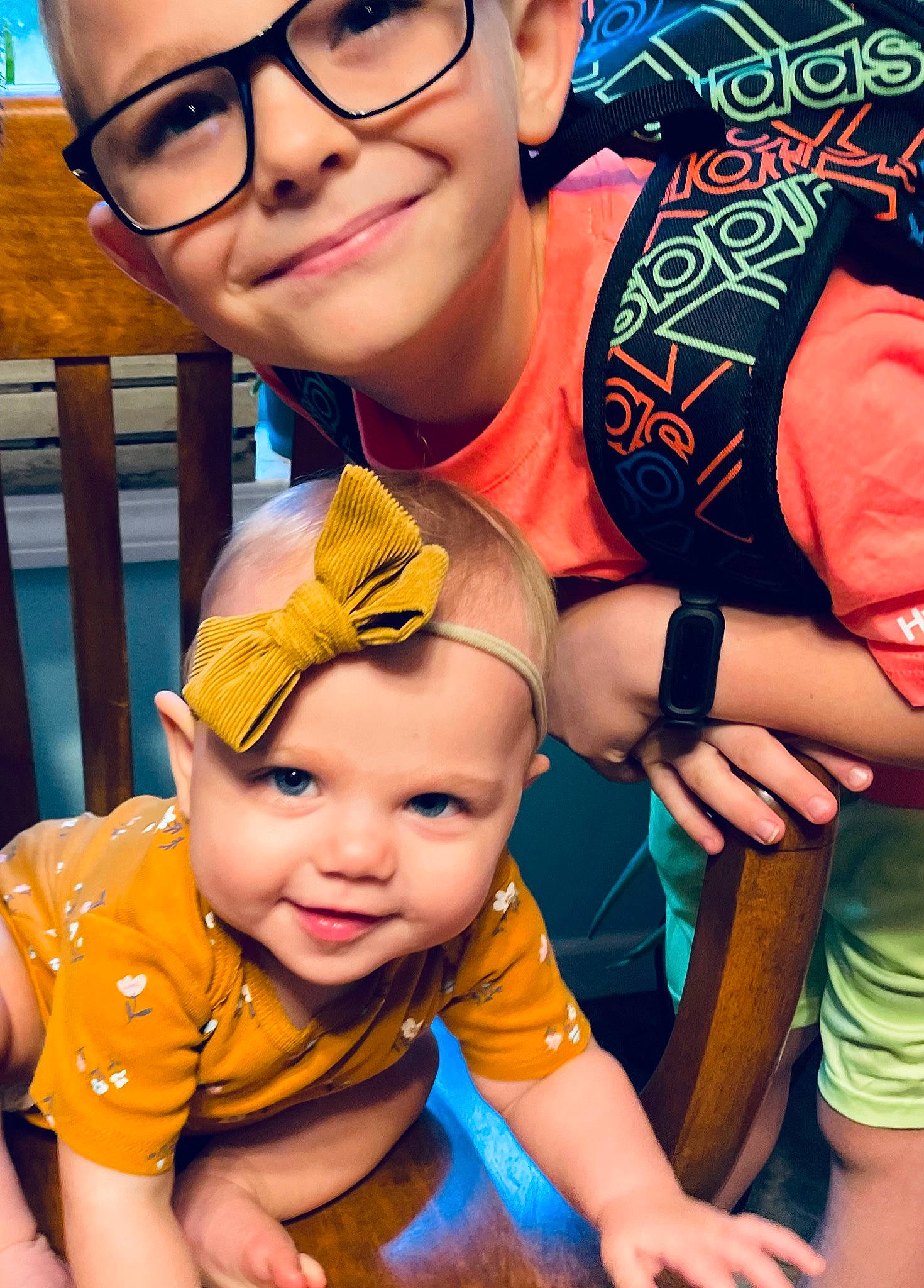Harlyn is registered to the contest to win money with this photo: child, cool, eyewear, face, facial_expression, fun, happy, headwear, human, joy, leisure, mouth, orange, organ, people, person, photograph, product, skin, smile