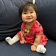 Isabella participe au concours pour gagner de l'argent avec cette photo : toddler, child, smiling, dress, socks, couch, indoor, happy, cute, sitting, hair, face, skin, furniture, person, young_child, plush, bright_colors, home, portrait