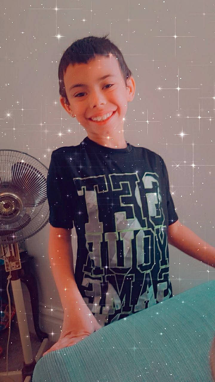 Tristian is registered to the contest to win money with this photo: arm, beauty, black_hair, cool, electric_blue, fashion, flash_photography, fun, hairstyle, happy, human, joy, mechanical_fan, muscle, organ, person, shoulder, sleeve, smile, space