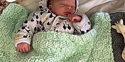 Elijah participe au concours pour gagner de l'argent avec cette photo : baby, bed, blanket, child, cozy, crib, cute, hand, hoodie, indoors, infant, knitted, mickey_mouse, nursery, peaceful, resting, sleeping, soft_toy, toy, warm