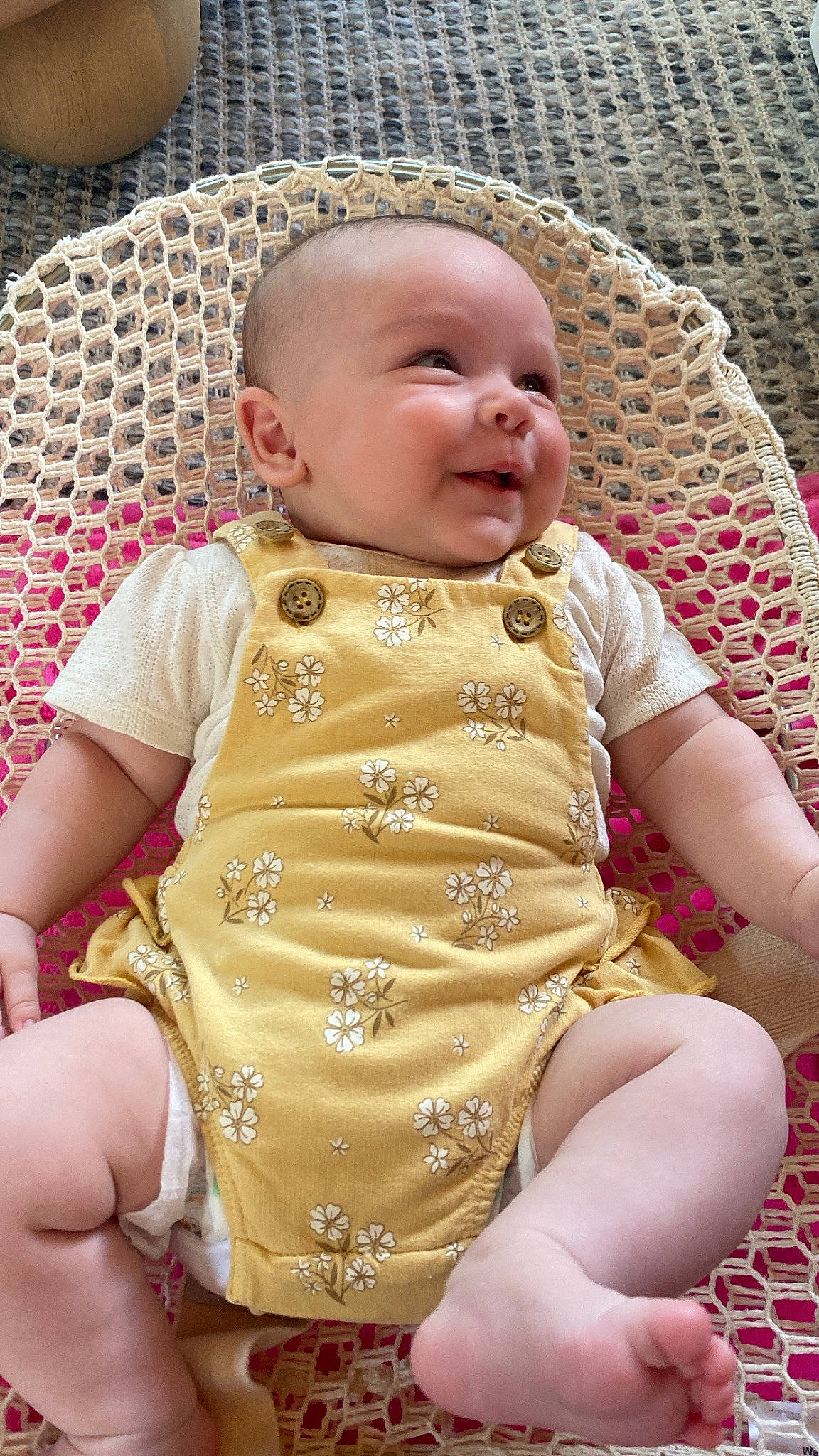 Alessandra is registered to the contest to win money with this photo: baby, baby_toddler_clothing, cheek, child, comfort, eye, happy, head, mouth, organ, pattern, person, pink, sitting, skin, sleeve, smile, stomach, textile, thigh