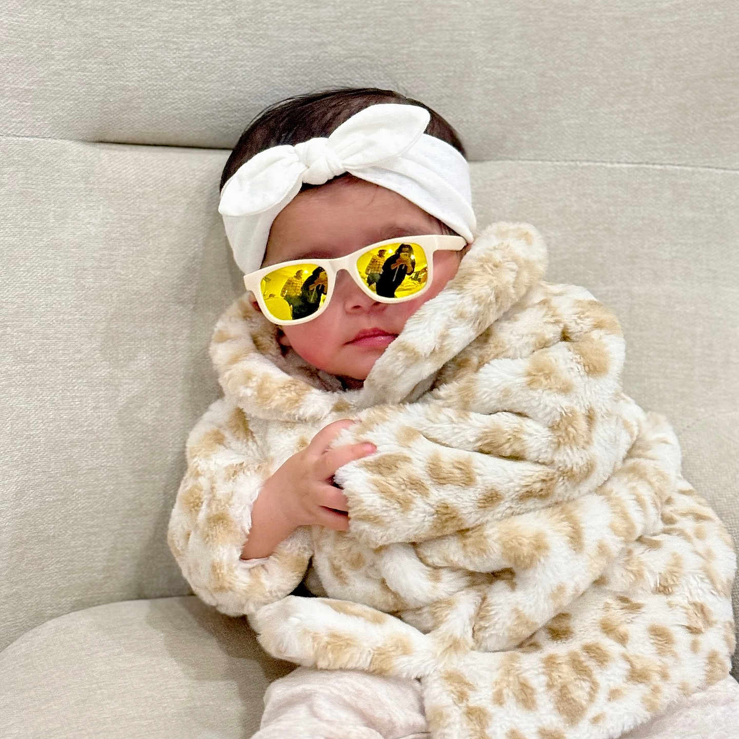Lotus Gautam is registered to the contest to win money with this photo: accessories, baby, blanket, clothing, face, fur, head, newborn, person, photography, portrait, sleeping, sunglasses