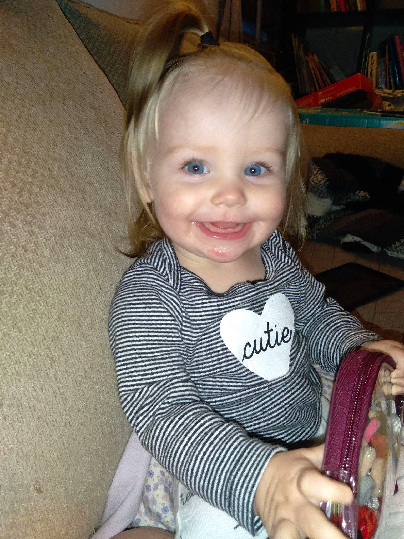 Ryleighann is registered to the contest to win money with this photo: arm, baby_toddler_clothing, cheek, chin, cool, eye, face, facial_expression, finger, hair, hairstyle, happy, head, human_body, iris, joy, person, product, skin, sleeve