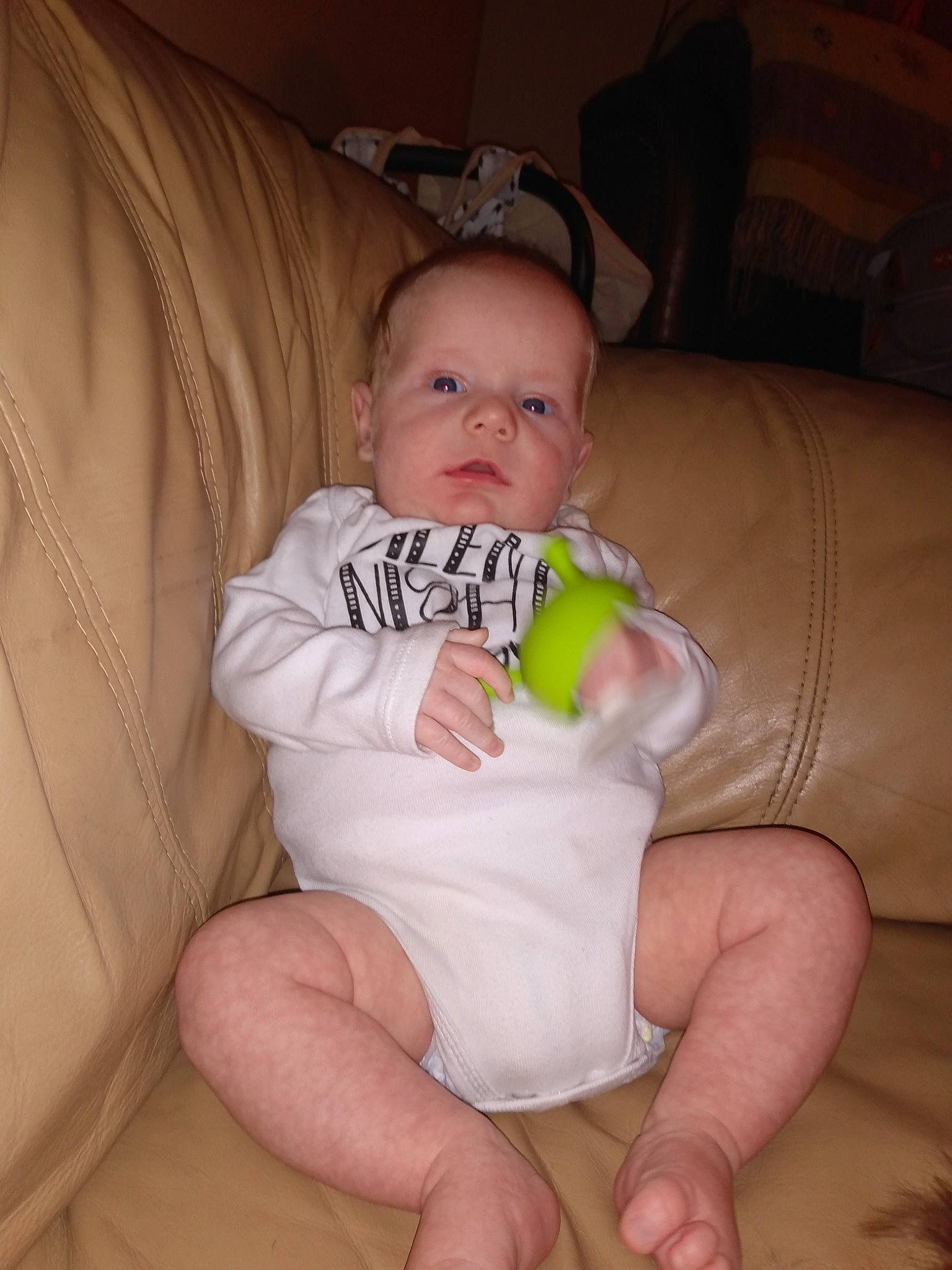 Jasper is registered to the contest to win money with this photo: baby, baby_toddler_clothing, cheek, comfort, eye, finger, hand, head, human_body, knee, leg, mouth, neck, nose, person, skin, stomach, textile, thigh, thumb