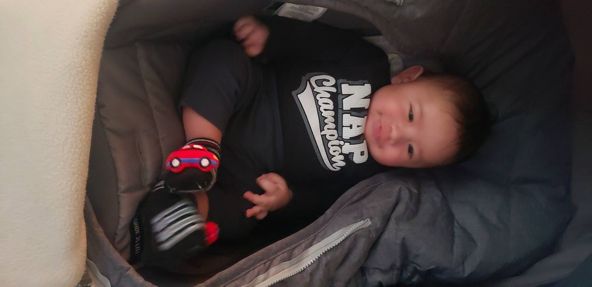 Amir joined the competition — help win amazing prizes! audio_equipment, automotive_lighting, baby, baby_toddler_clothing, cheek, comfort, cool, darkness, finger, flash_photography, fun, hand, mouth, nail, person, sitting, sleeve, thumb, toddler, tree