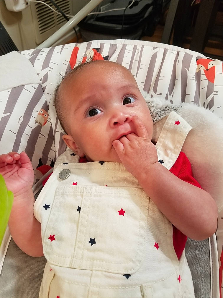 Esme is registered to the contest to win money with this photo: baby, baby_products, baby_safety, baby_toddler_clothing, chair, cheek, child, collar, comfort, face, gesture, happy, linens, lip, nose, pattern, person, skin, sleeve, toddler