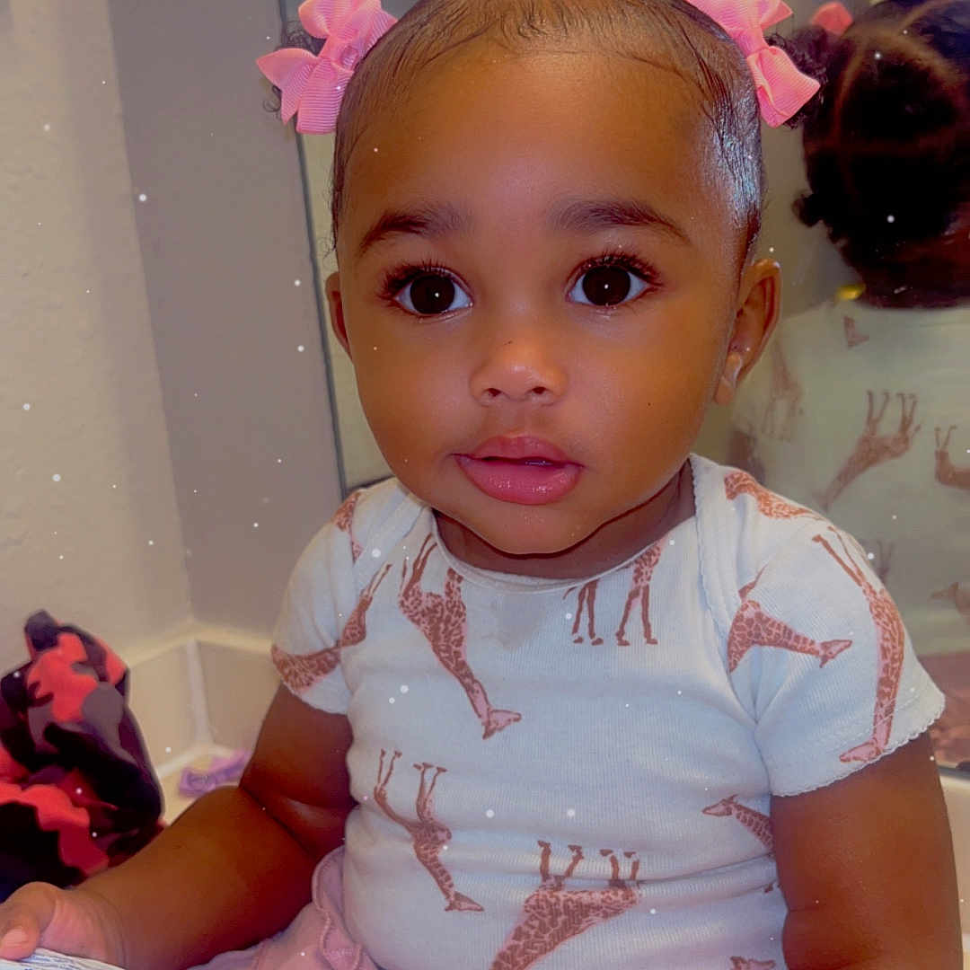 Takala joined the competition — help win amazing prizes! bathroom, big_eyes, child, clothing, countertop, curly_hair, cute, giraffe_print, girl, holding, indoor, mirror, person, pink_bows, portrait, reflection, shirt, sitting, skirt, toddler