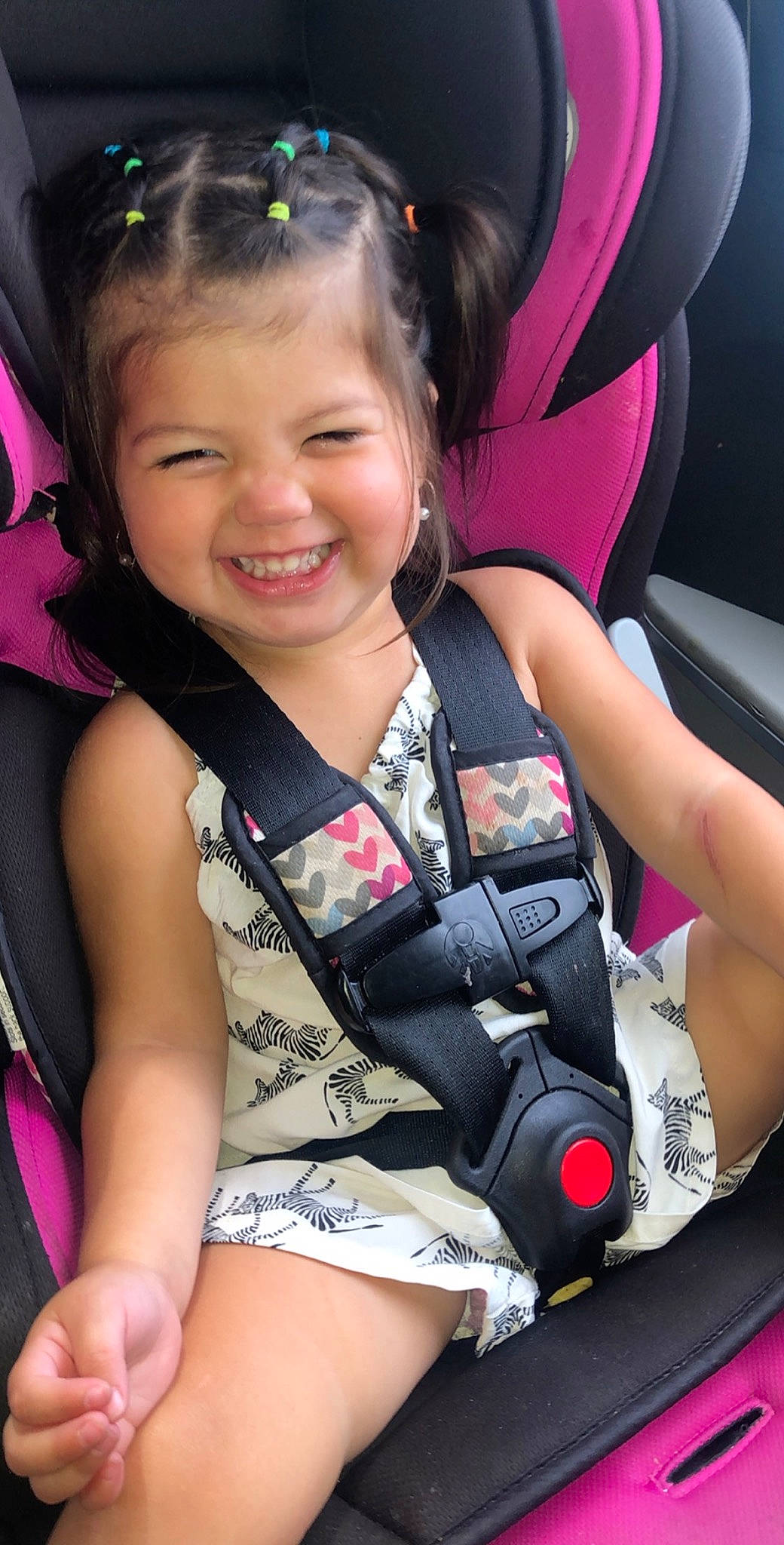 Raina joined the competition — help win amazing prizes! arm, auto_part, baby_carriage, baby_products, black_hair, car_seat, cheek, child, finger, fun, happy, joy, leg, long_hair, person, pink, product, skin, smile, thigh