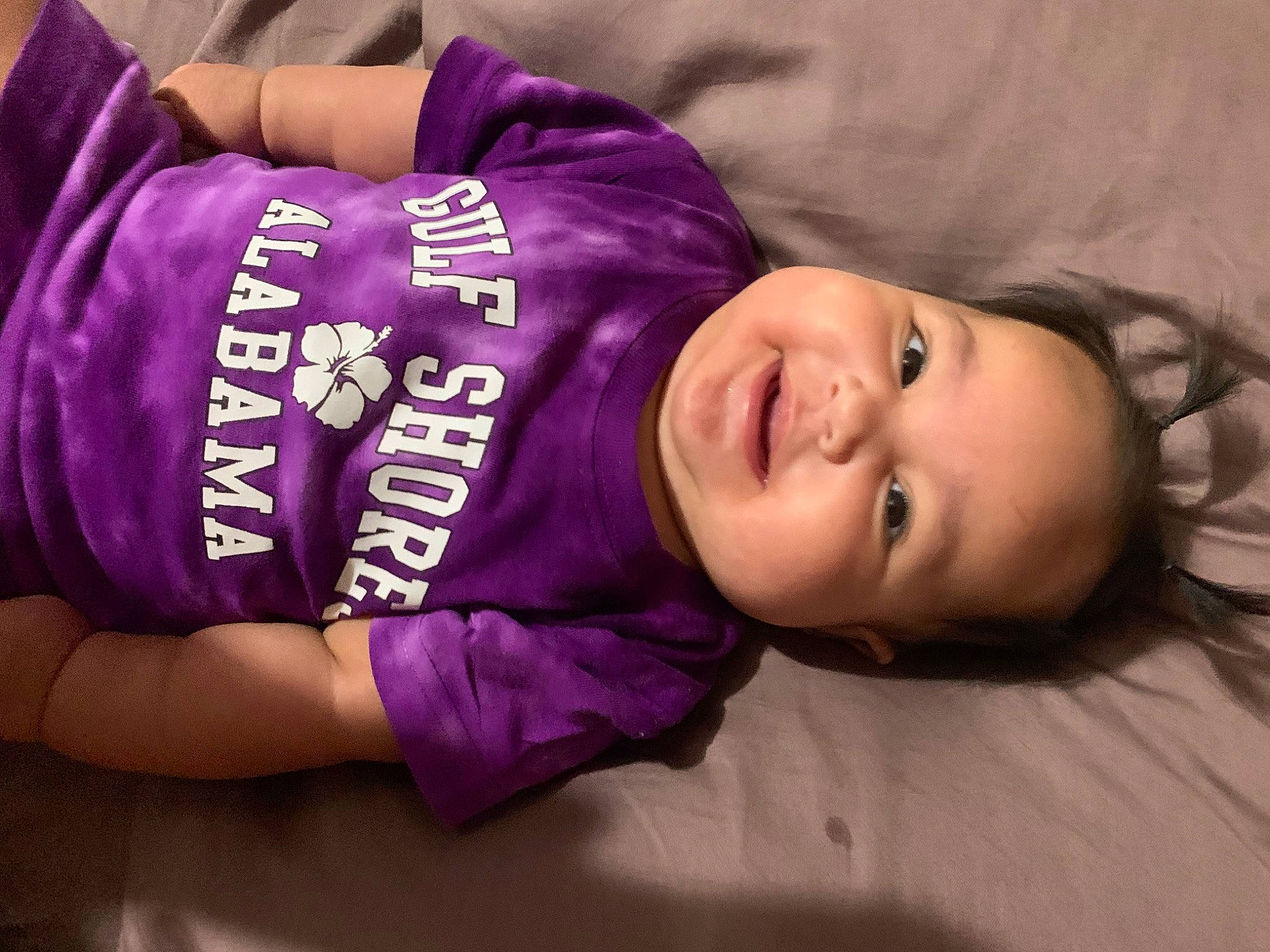 Henley joined the competition — help win amazing prizes! baby, baby_toddler_clothing, cheek, child, font, fun, happy, headgear, magenta, neck, person, pink, portrait_photography, purple, sleeve, smile, sportswear, toddler, violet