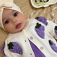 Kaymie participe au concours pour gagner de l'argent avec cette photo : baby, infant, face, eyes, hat, sweater, purple, cream, grapes, knitwear, blanket, cake, heart_shaped, candle, celebration, cute, lying_down, soft_texture, close_up, indoor