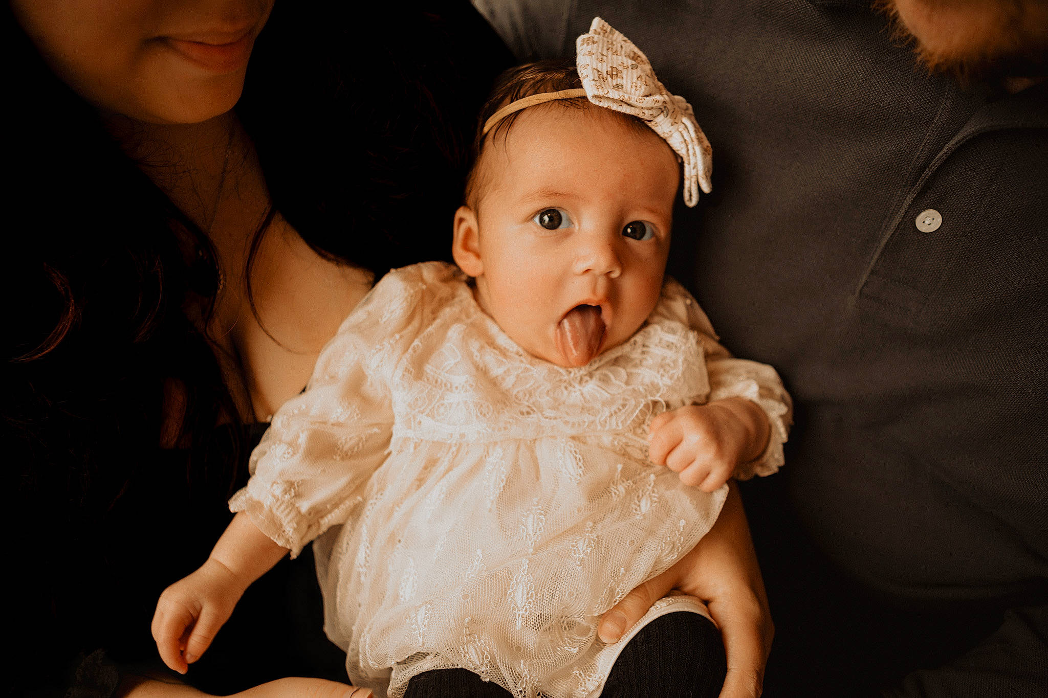 Alessandra is registered to the contest to win money with this photo: baby, baby_toddler_clothing, cheek, dress, embellishment, event, fashion_accessory, flash_photography, formal_wear, fun, gesture, happy, headpiece, iris, jewellery, people, person, sitting, skin, sleeve