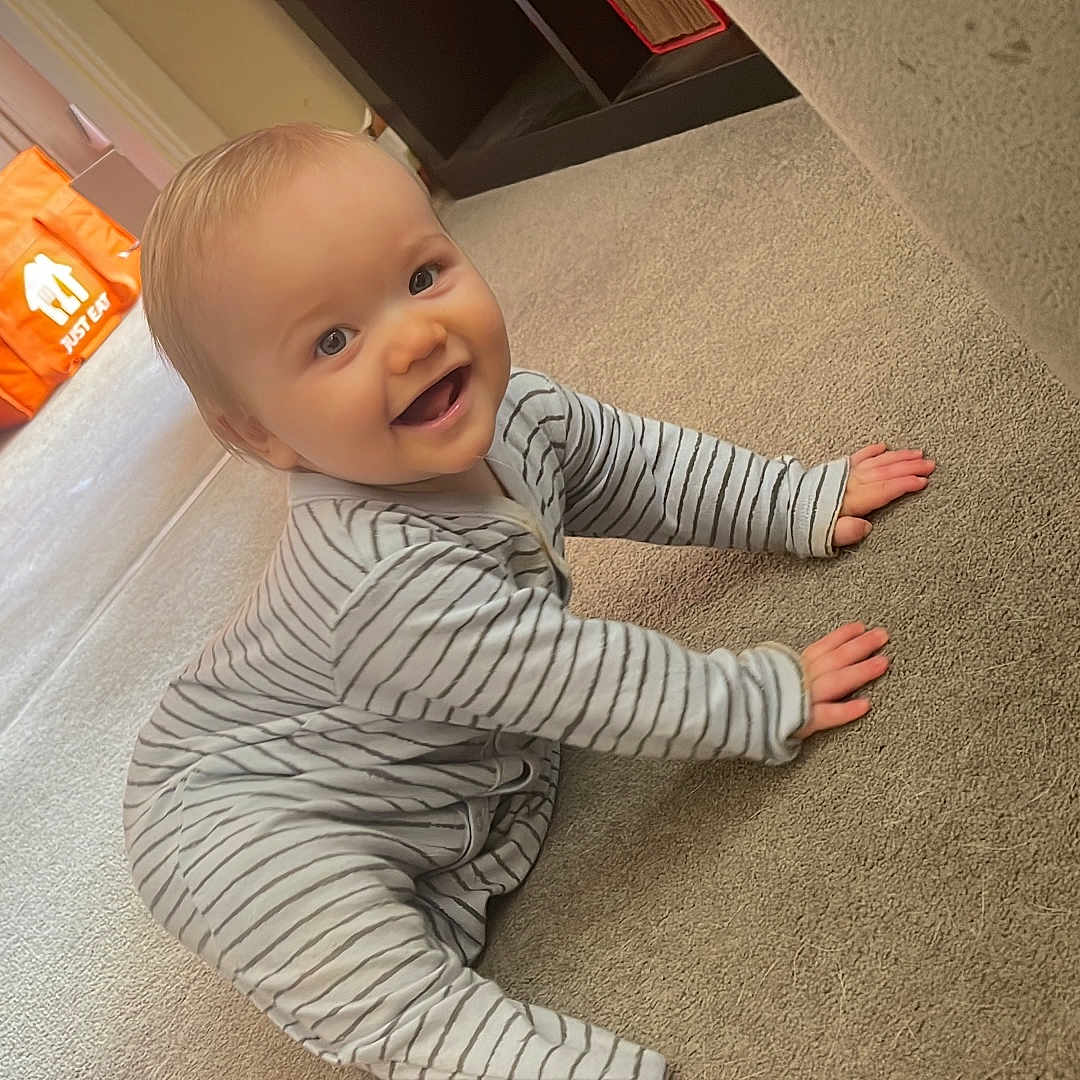 Harley is registered to the contest to win money with this photo: baby, babycrawling, babylaughing, crawling, face, firstaid, happy, head, person, photography, portrait