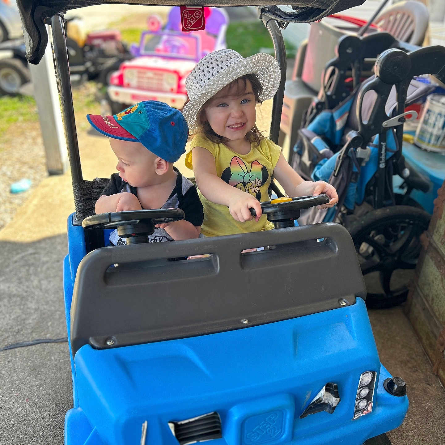 Nova joined the competition — help win amazing prizes! baby, baseballcap, cap, car, child, clothing, face, female, girl, hat, head, machine, outdoors, person, photography, portrait, summer, transportation, vehicle, wheel