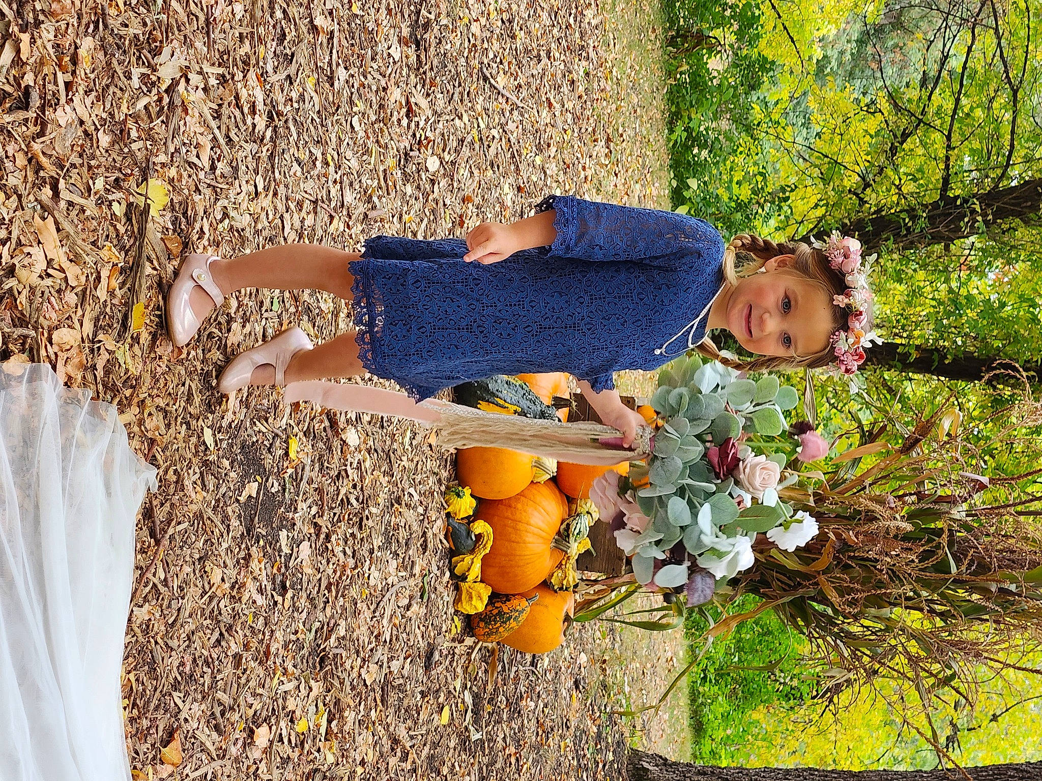Madilynn is registered to the contest to win money with this photo: calabaza, electric_blue, fruit, fun, gourd, grass, happy, headwear, human_leg, joy, landscape, leisure, natural_foods, people_in_nature, person, plant, pumpkin, sitting, soil, summer