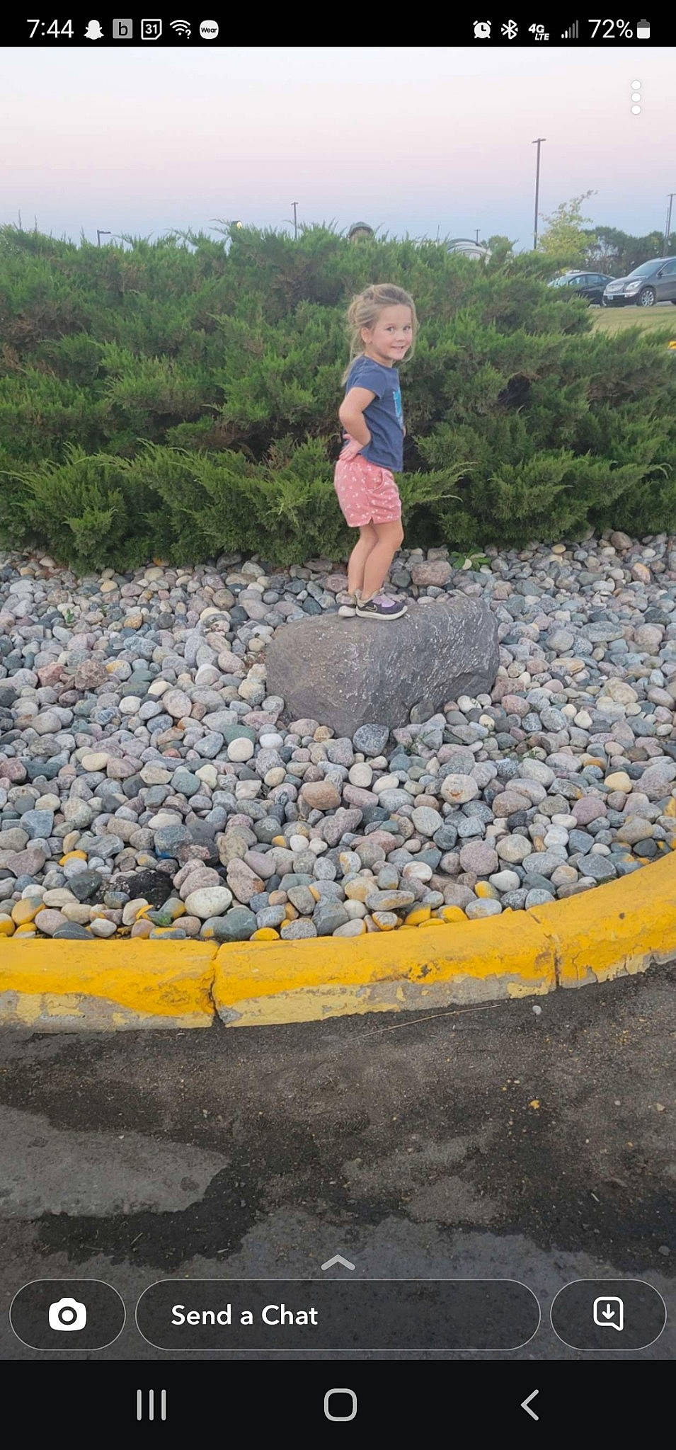 Madilynn is registered to the contest to win money with this photo: asphalt, bedrock, cobblestone, concrete, electric_blue, flooring, fun, geological_phenomenon, grass, joy, landscape, leisure, person, plant, recreation, road, road_surface, rock, soil, stone_wall