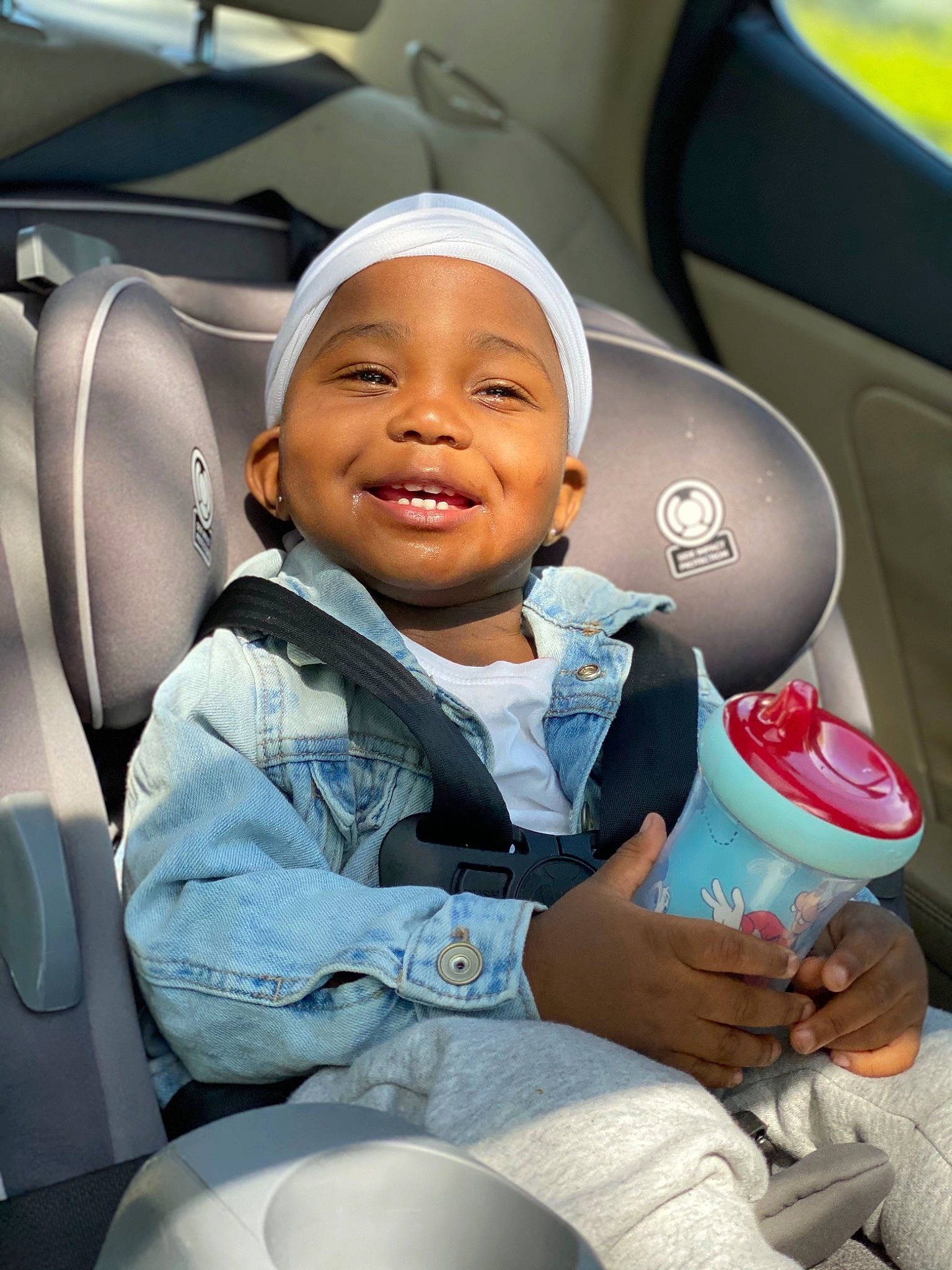 Demari joined the competition — help win amazing prizes! air_travel, airline, auto_part, automotive_design, car_seat, child, comfort, electric_blue, family_car, fun, happy, head_restraint, joy, luxury_vehicle, motor_vehicle, passenger, person, smile, toddler, travel