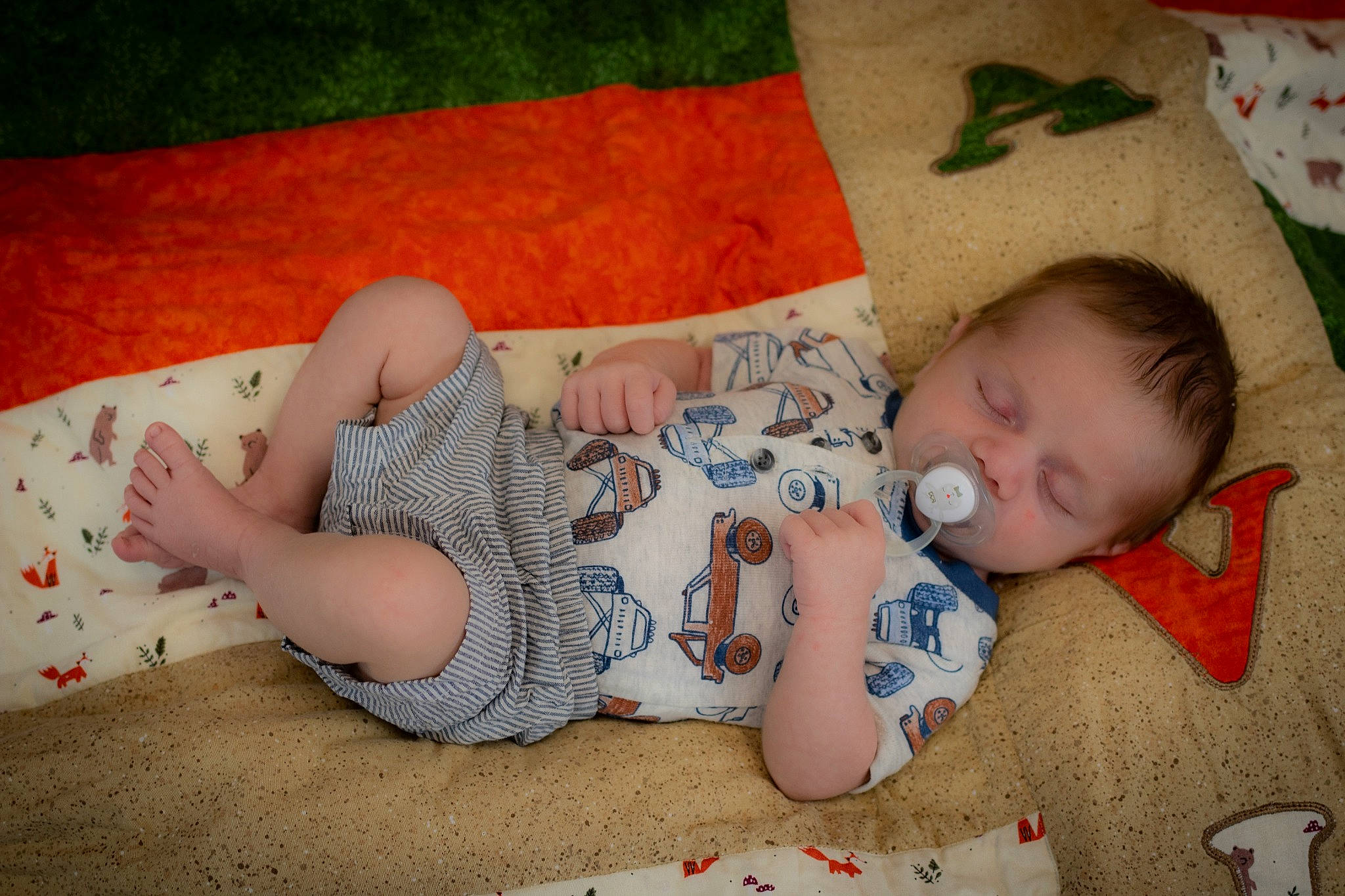Alvin is registered to the contest to win money with this photo: baby, baby_products, baby_toddler_clothing, bedtime, cheek, child, comfort, couch, finger, grass, head, human_leg, linens, nap, pattern, person, room, skin, textile, thigh