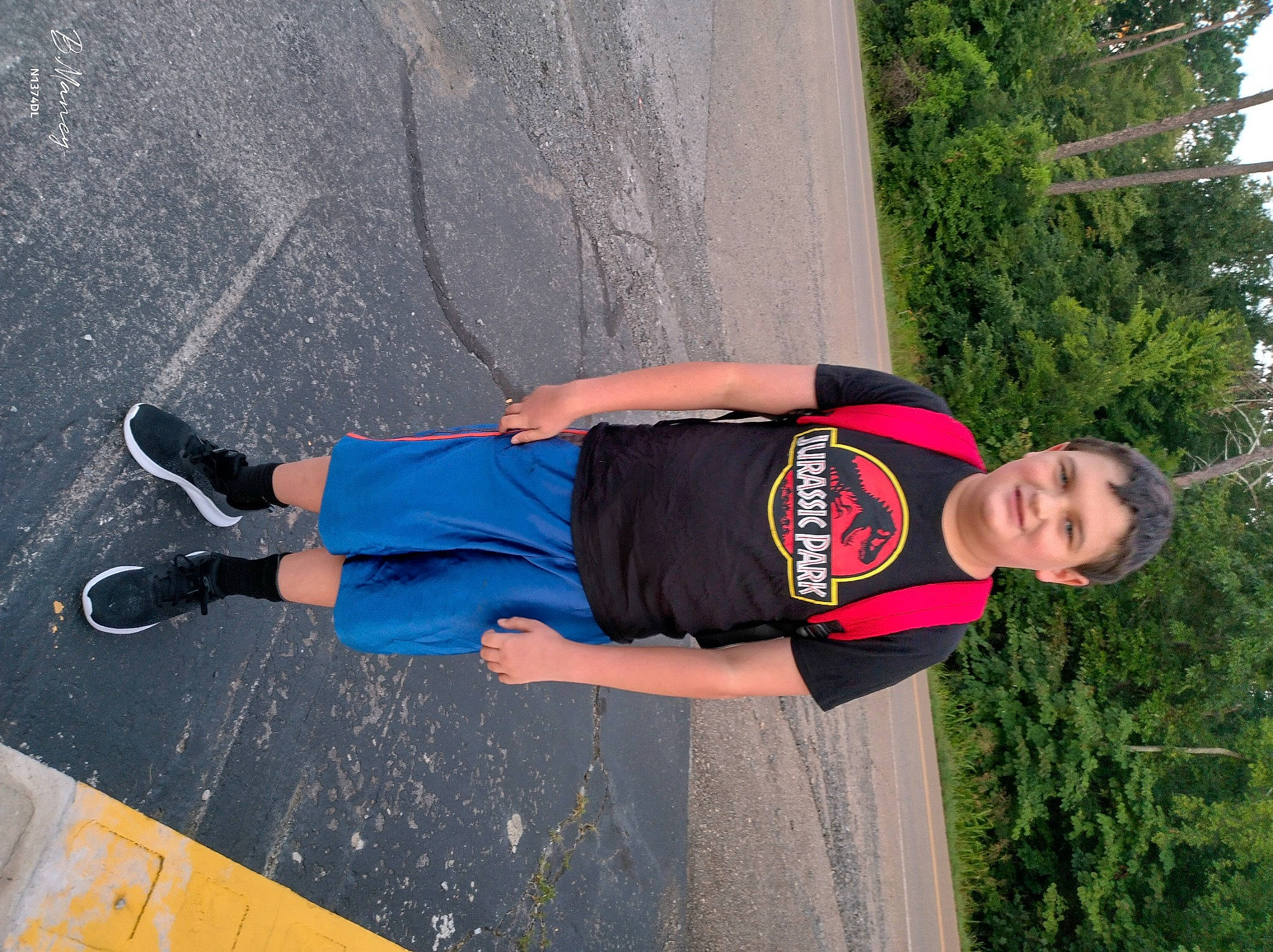 Nolan joined the competition — help win amazing prizes! arm, asphalt, balance, calf, elbow, electric_blue, human_leg, joy, knee, leisure, outdoor_shoe, person, plant, recreation, shorts, sports, sports_uniform, sportswear, t_shirt, thigh