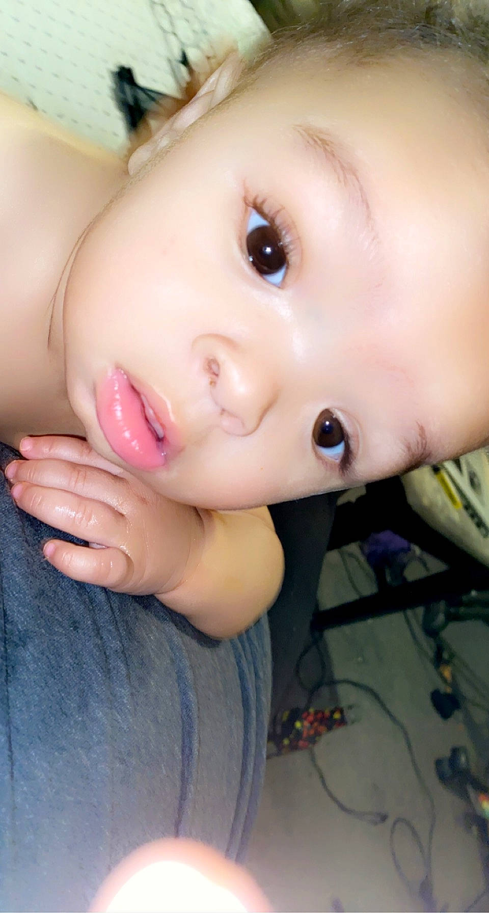 Davion is registered to the contest to win money with this photo: arm, baby, black_hair, cheek, chest, ear, eye, eyelash, finger, gesture, hand, happy, human_body, iris, jaw, lip, mouth, nail, nose, person