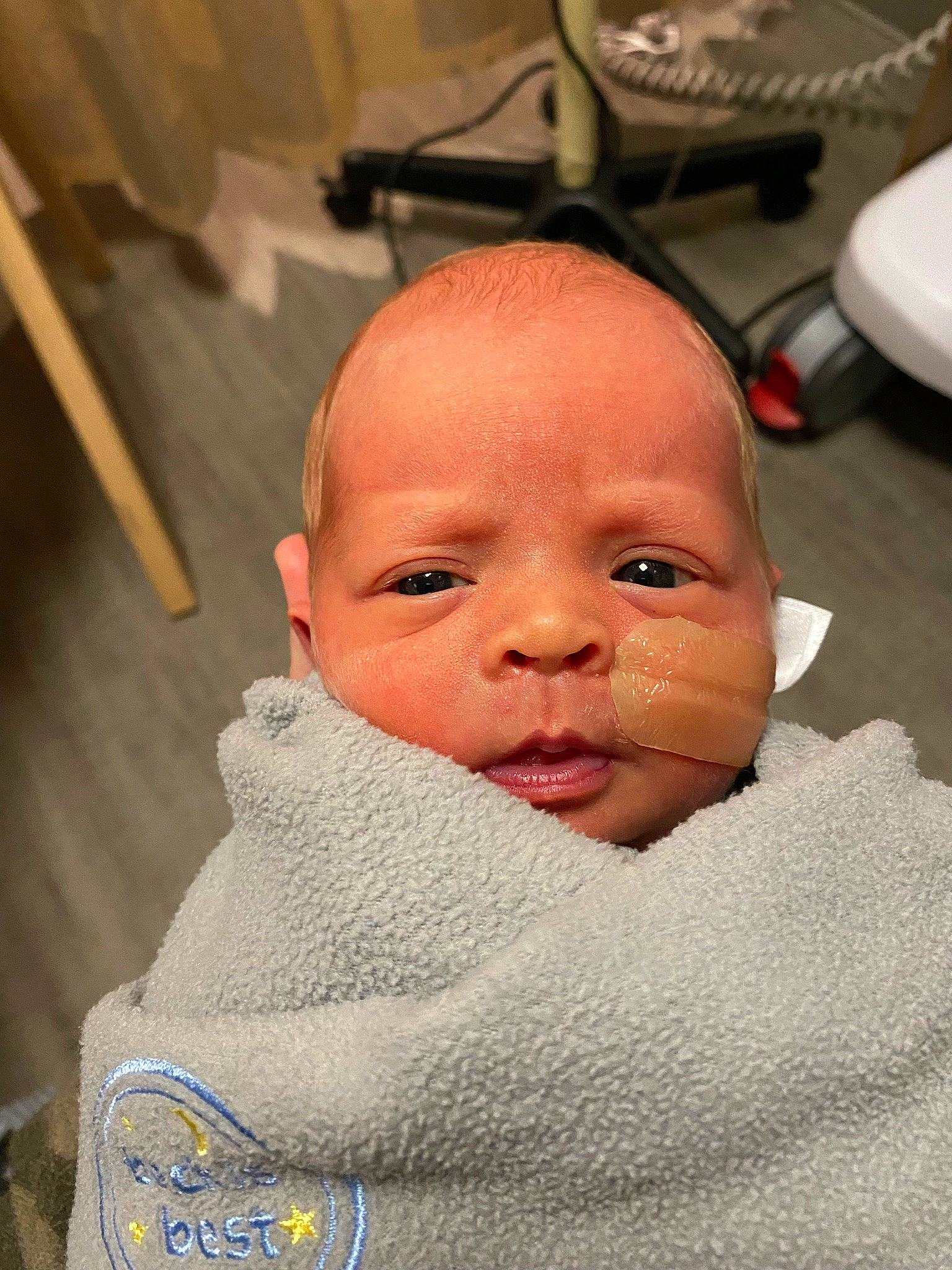 Maelynn is registered to the contest to win money with this photo: baby, baby_products, baby_toddler_clothing, chair, cheek, child, chin, comfort, eyelash, happy, linens, nose, person, room, skin, thumb, toddler, wood, wool, woolen