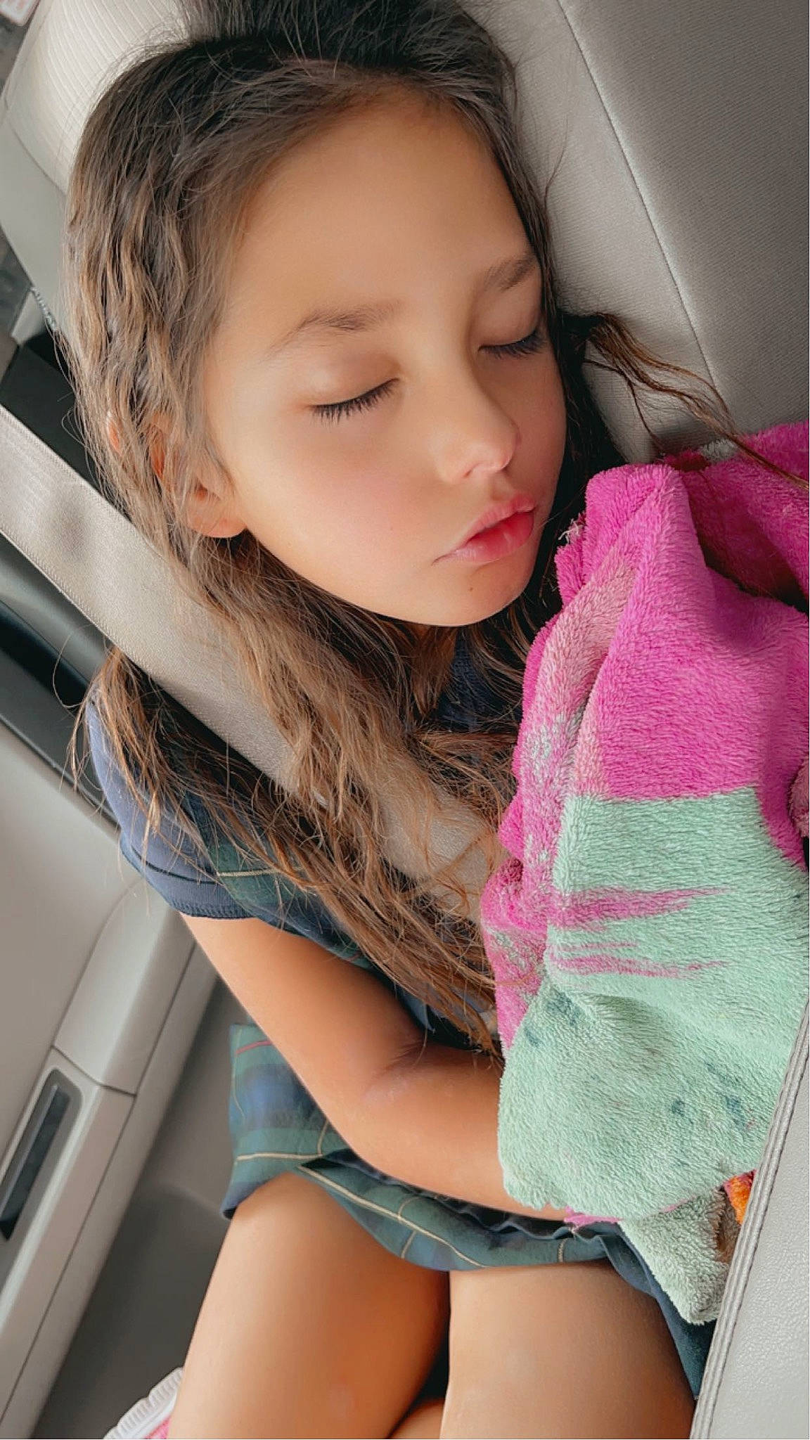 Esamay is registered to the contest to win money with this photo: automotive_design, automotive_exterior, beauty, black_hair, brown_hair, child, eyelash, finger, grass, happy, human_leg, lip, long_hair, magenta, neck, person, personal_luxury_car, skin, thigh, toddler