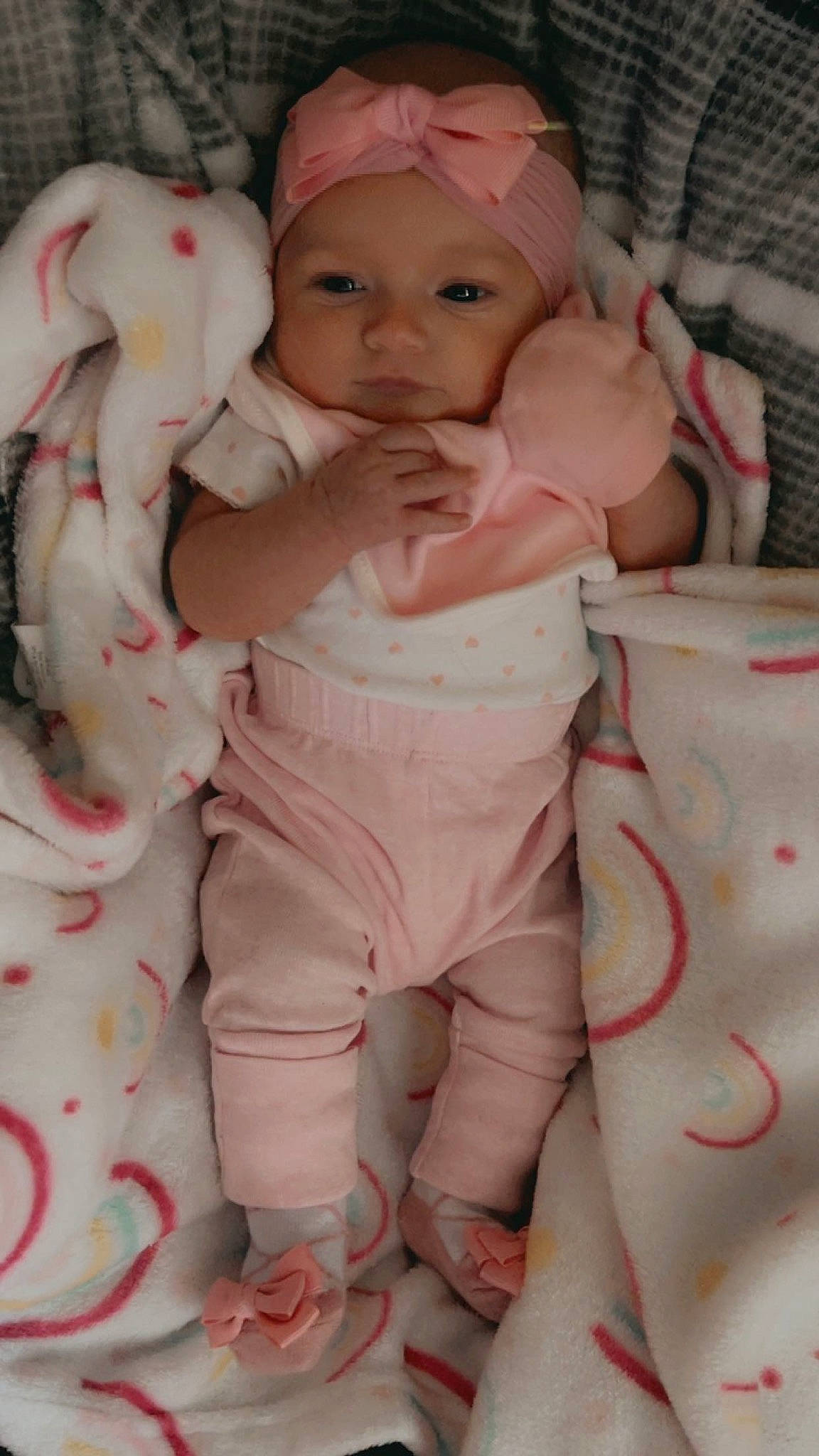 Genevieve is registered to the contest to win money with this photo: abdomen, baby, baby_safety, baby_sleeping, baby_toddler_clothing, cheek, chest, child, comfort, gesture, happy, headwear, linens, person, pink, skin, sleeve, smile, thumb, toddler