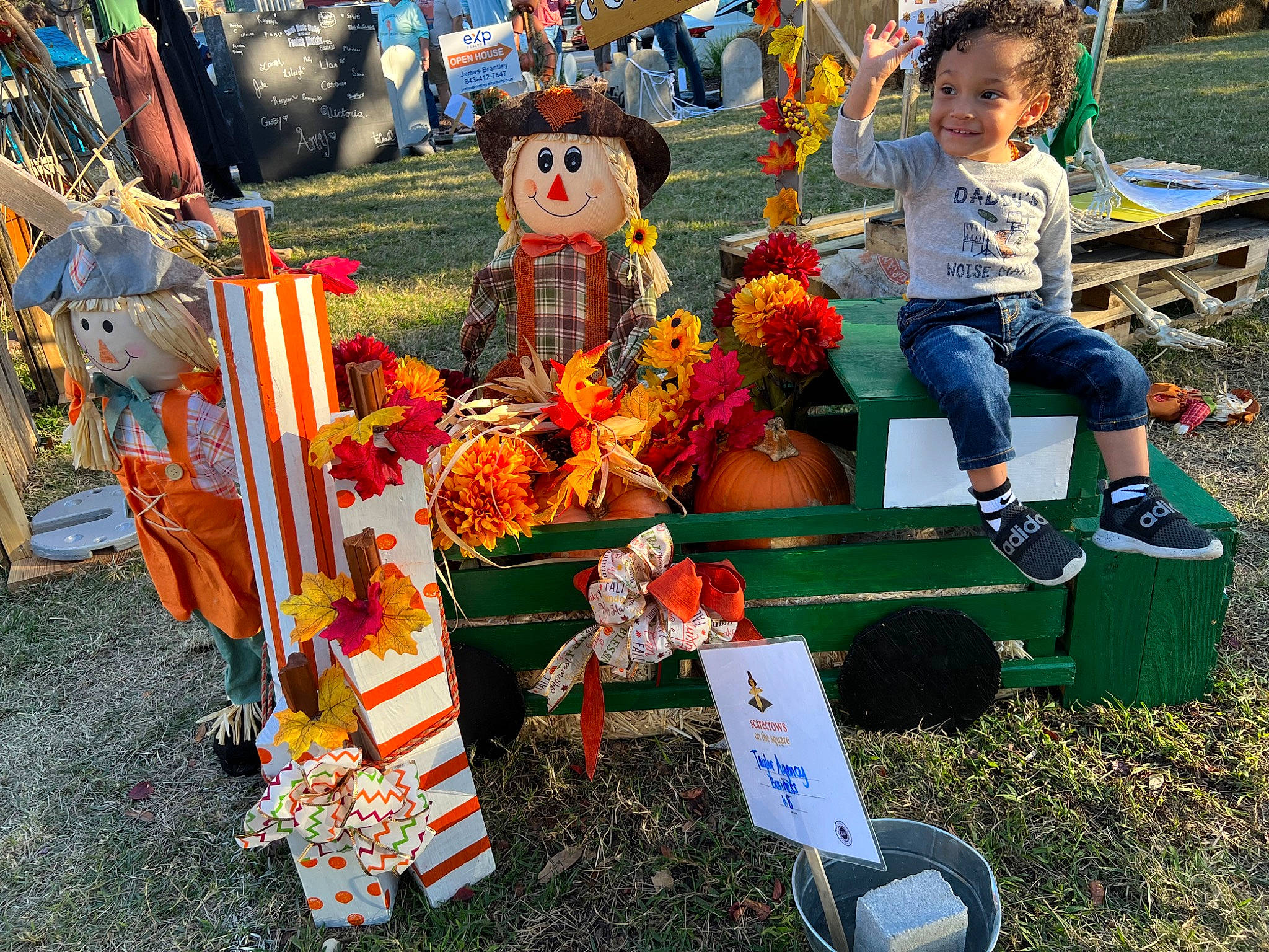 Graysen joined the competition — help win amazing prizes! auto_part, automotive_wheel_system, bench, city, event, festival, flower, fun, grass, joy, leisure, person, plastic, pole, recreation, toddler, toy