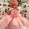 Serenityrose joined the competition — help win amazing prizes! newborn, baby, infant, pink_tutu, flower_accessory, sleeping, blanket, footprint_pattern, clasped_hands, cute, soft, resting, tiny, adorable, child, newborn_clothing, peaceful, portrait, indoor, cozy