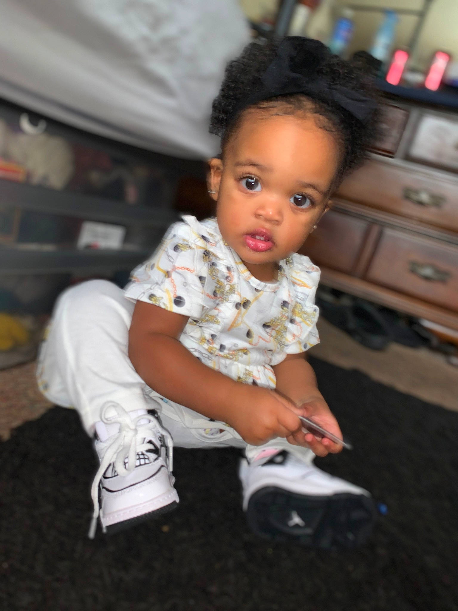 Makynzie joined the competition — help win amazing prizes! baby_toddler_clothing, boot, cabinetry, chest, chest_of_drawers, child, cupboard, drawer, event, flash_photography, flooring, fun, happy, human_leg, knee, person, sitting, skin, sleeve, sock