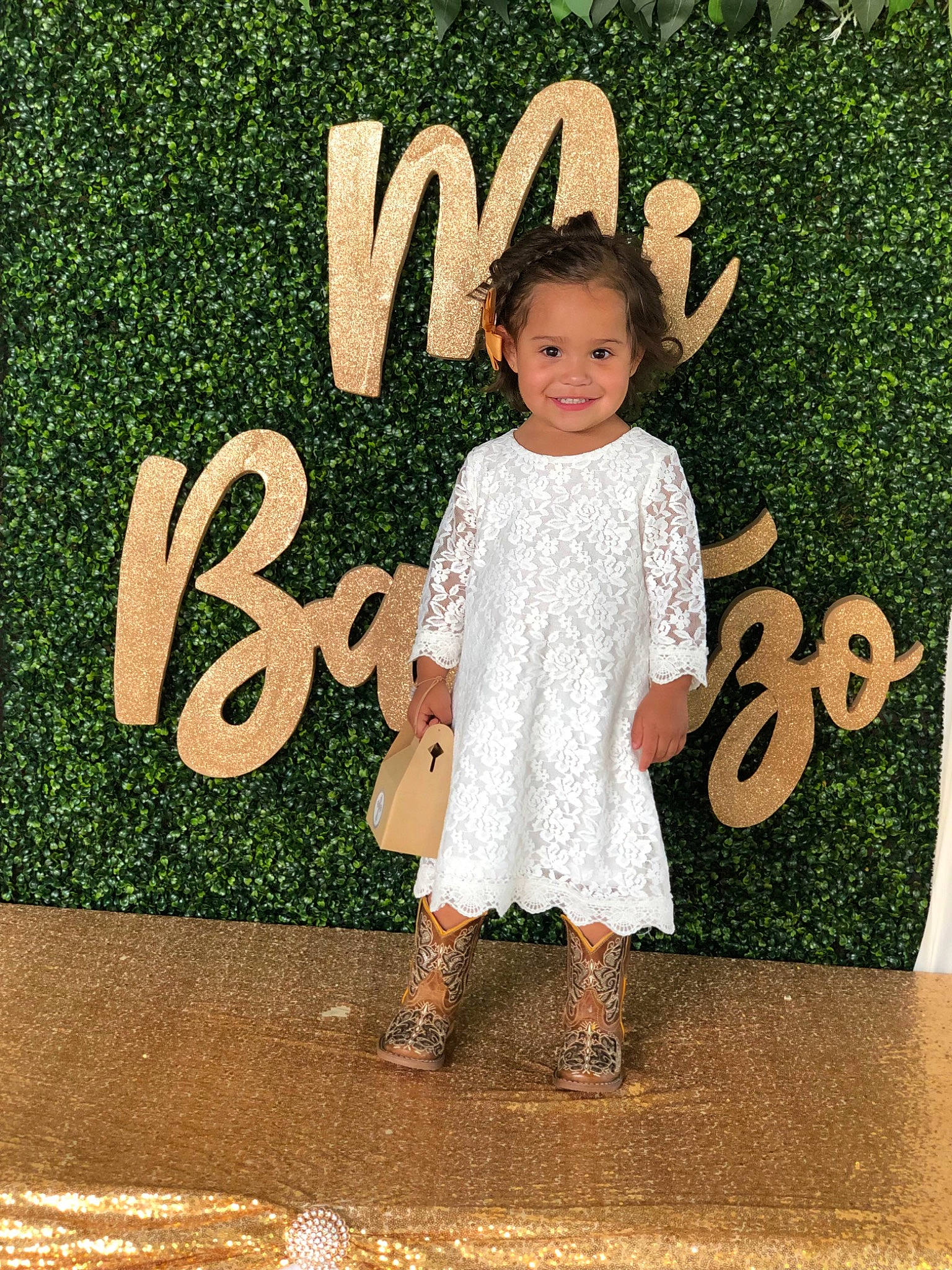 Sarahi is registered to the contest to win money with this photo: baby_toddler_clothing, child, child_model, cool, flooring, font, fun, gesture, graphics, grass, happy, joy, logo, magenta, pattern, people_in_nature, person, sleeve, smile, t_shirt